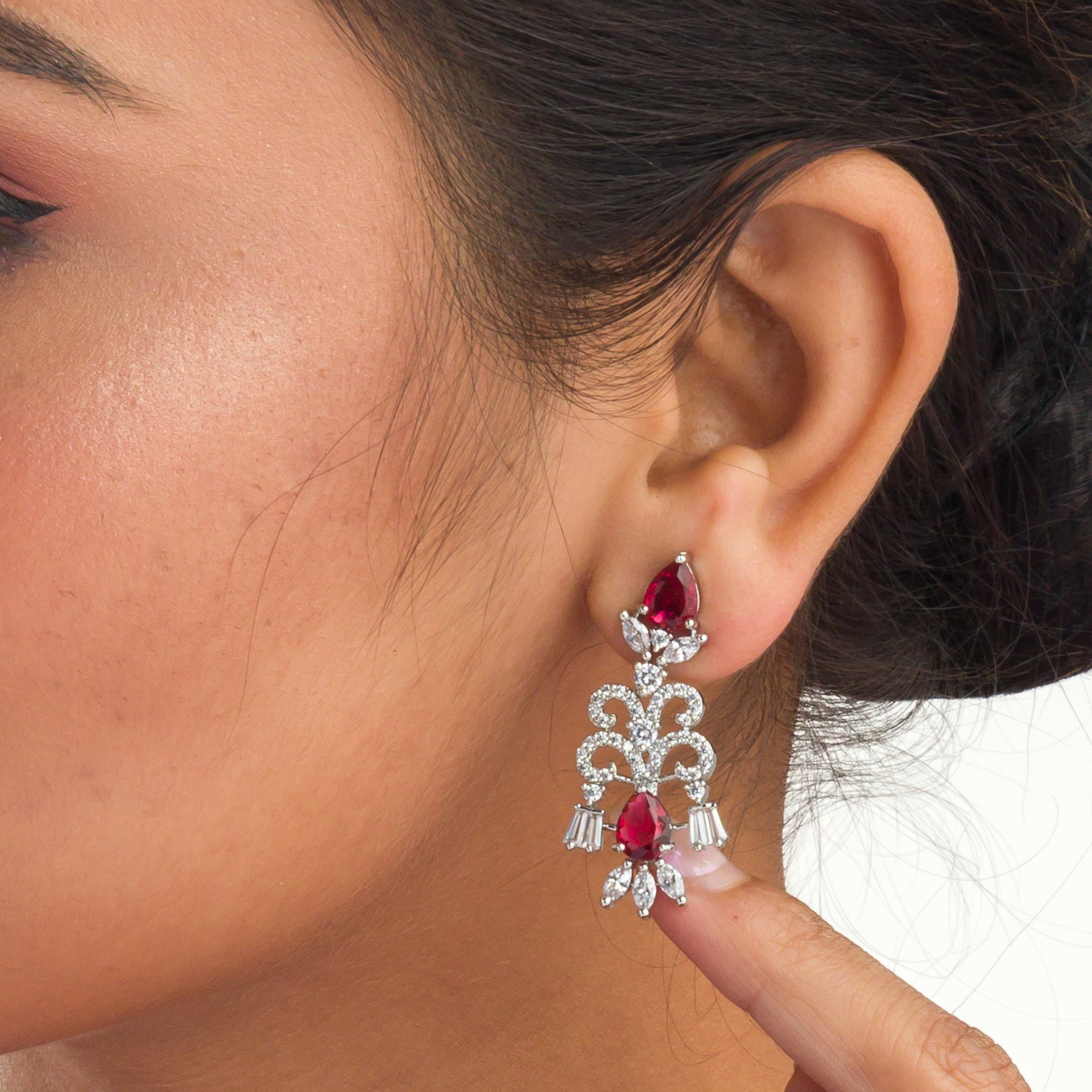 "Red and silver zircon necklace combines sleek silver polish with sophisticated elegance."