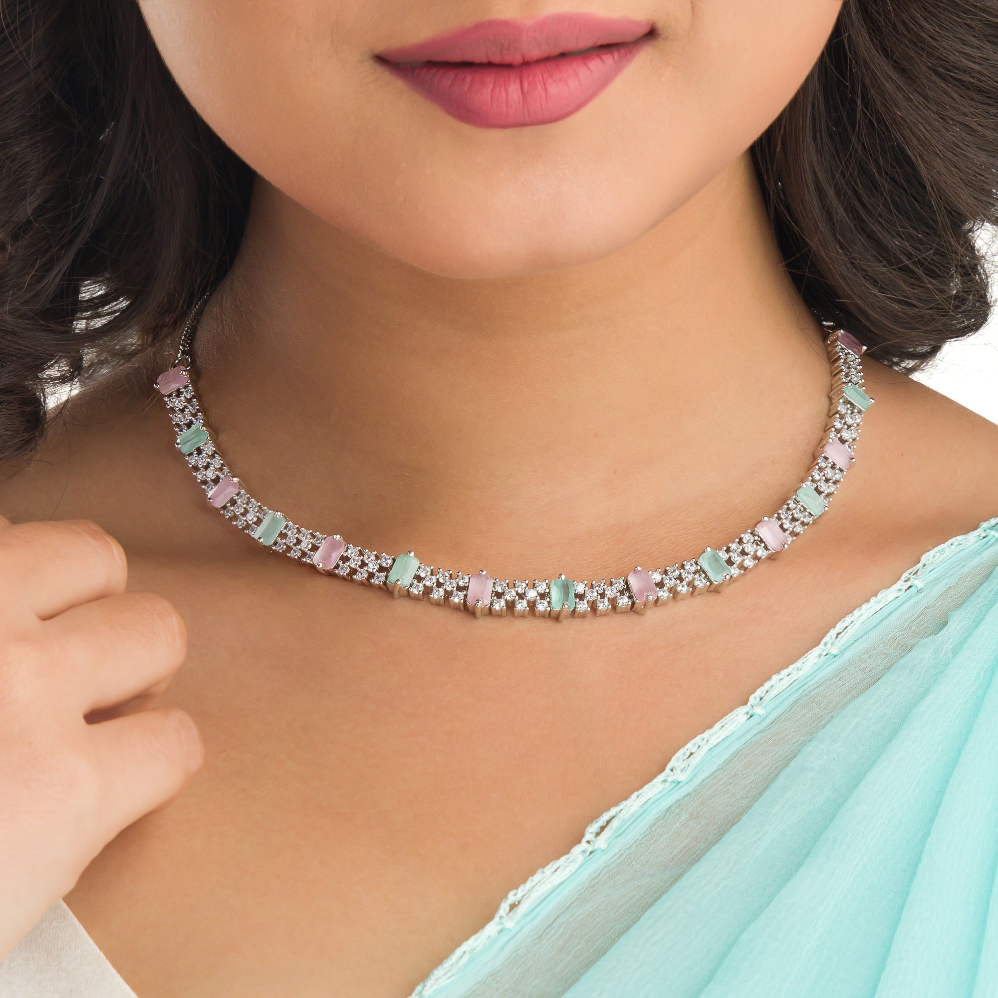 "Vibrant pink and green zircon necklace offers an eye-catching, colorful design."