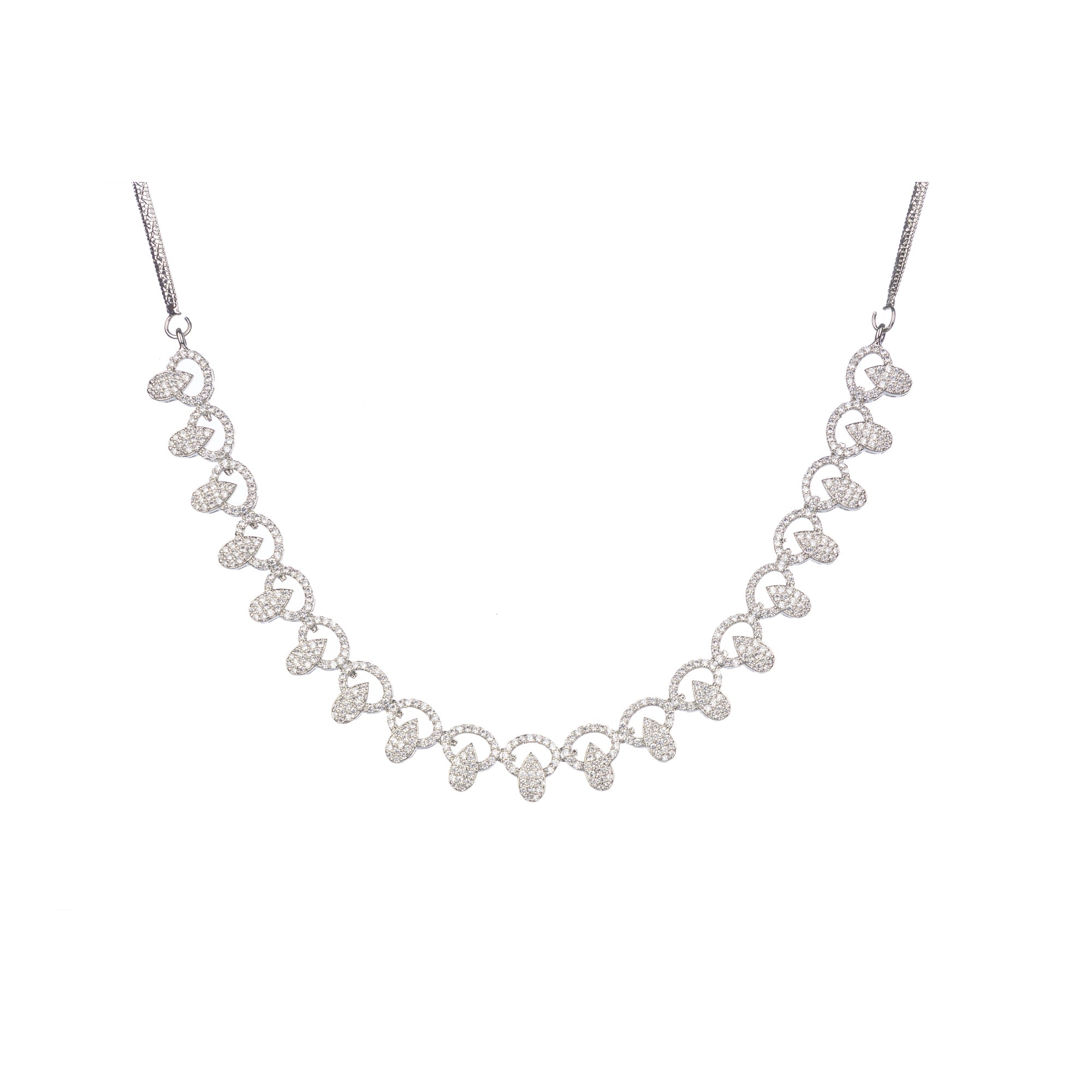 "Zircon necklace with large stone drop adds dramatic sparkle and elegance."