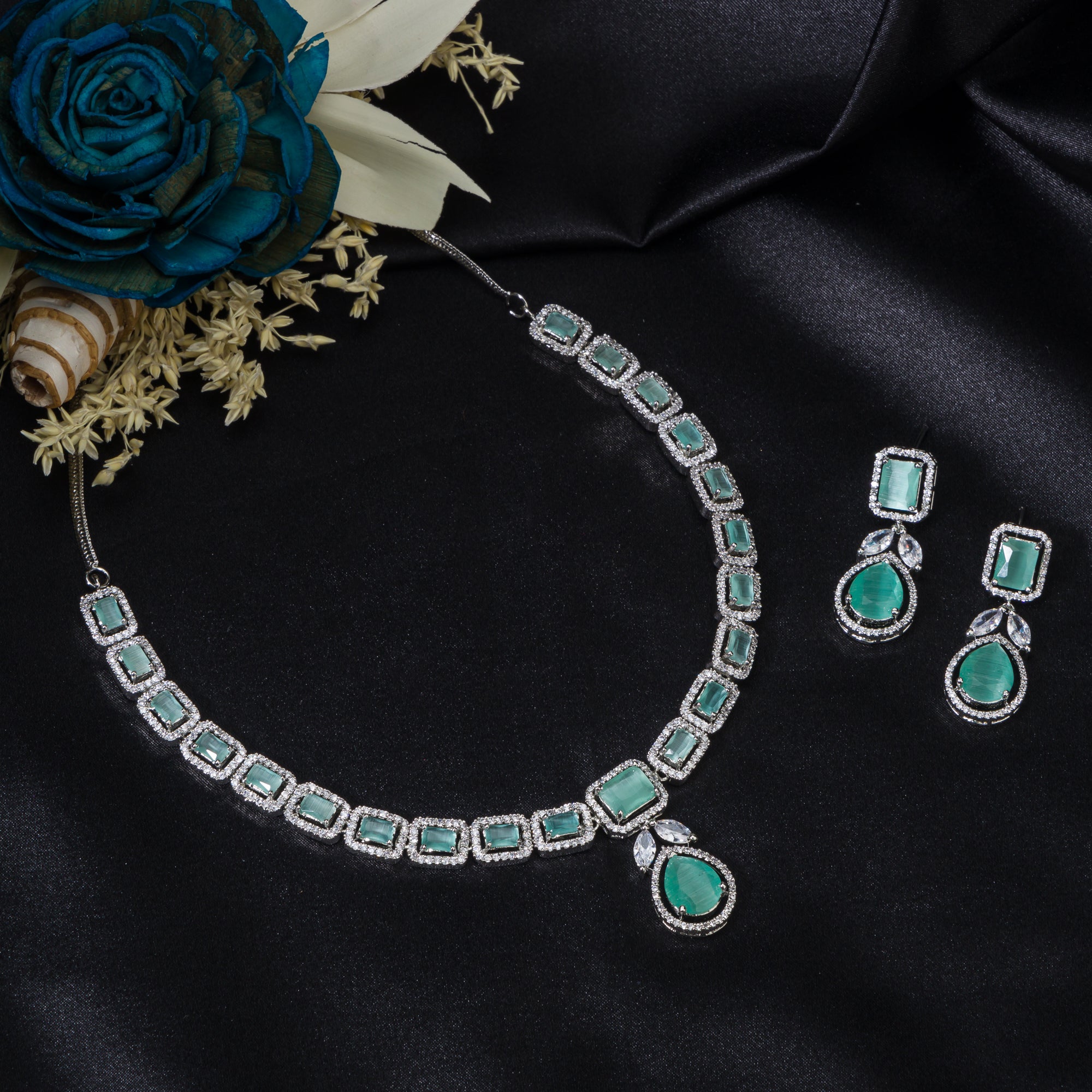 "Captivating green zircon necklace adds vibrant elegance for a festival-ready look."