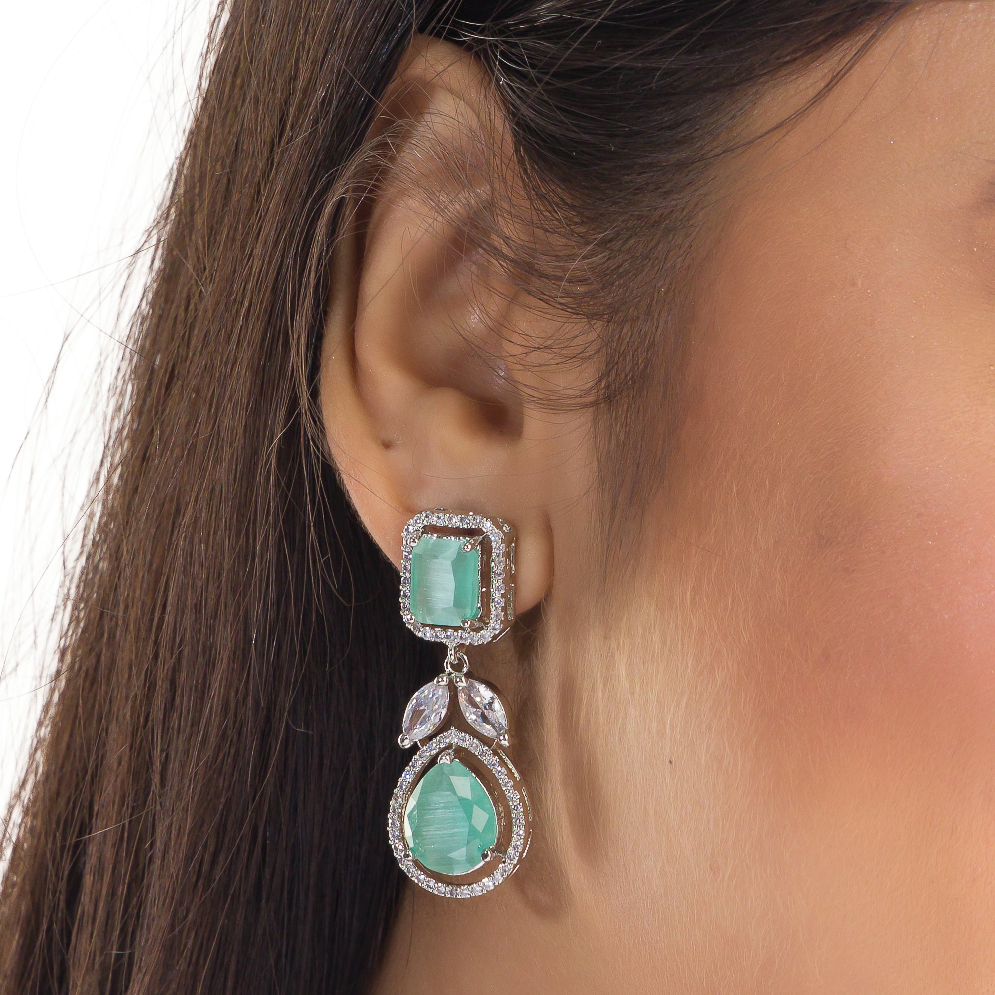 "Captivating green zircon necklace adds vibrant elegance for a festival-ready look."