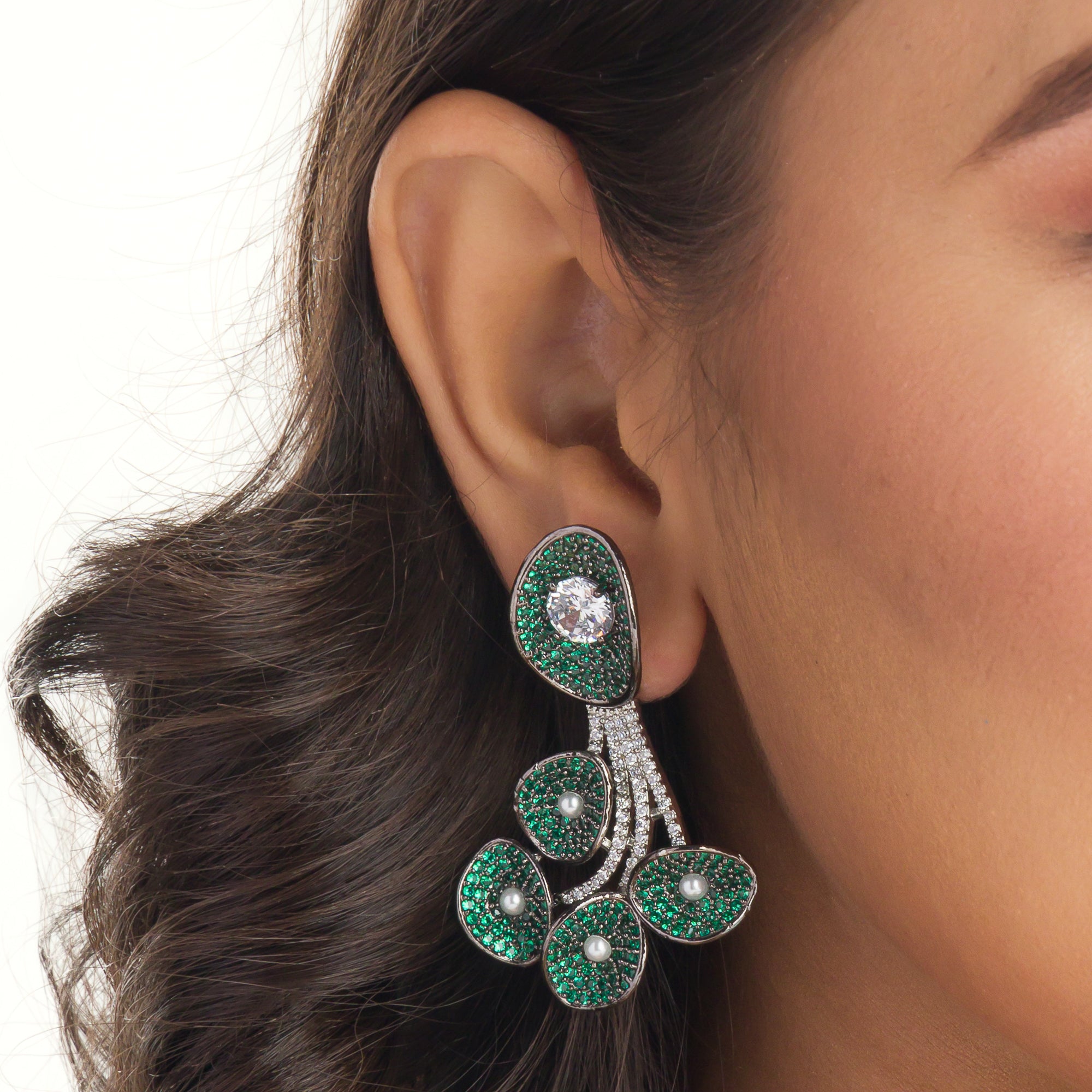 Tree-shaped necklace with green and white zircons brings a unique, elegant charm to any party look.