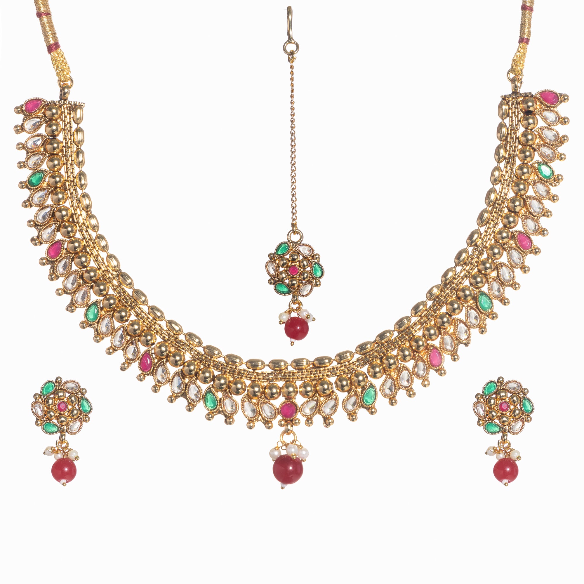 Gold-tone necklace with Kundan and Maang Tikka offers a regal and elegant party statement.