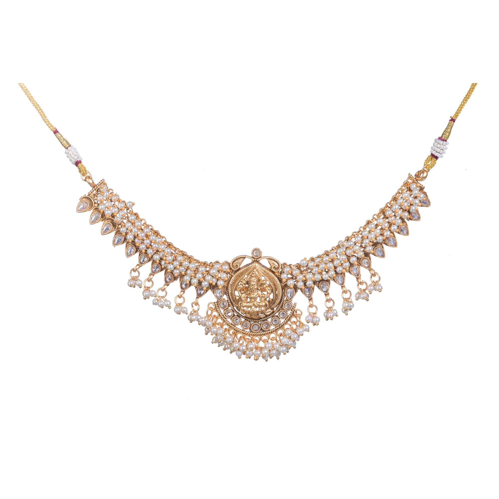 Graceful temple necklace with white pearls adds a touch of classic festival sophistication.