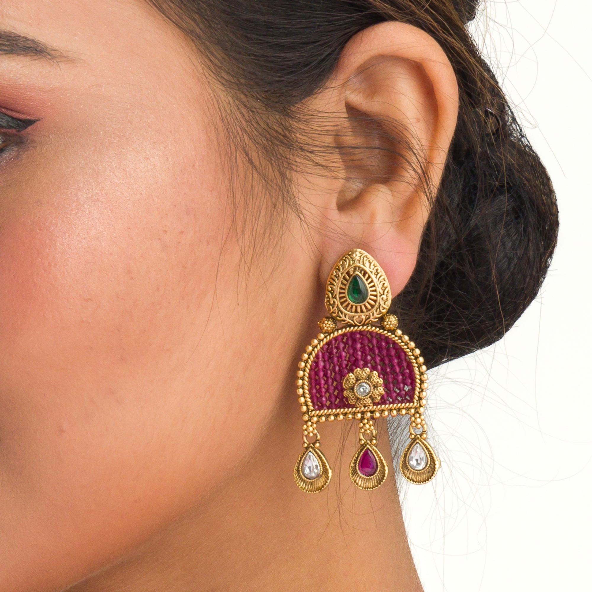 Elegant pink gold-tone short necklace exudes understated charm for a graceful festival look.