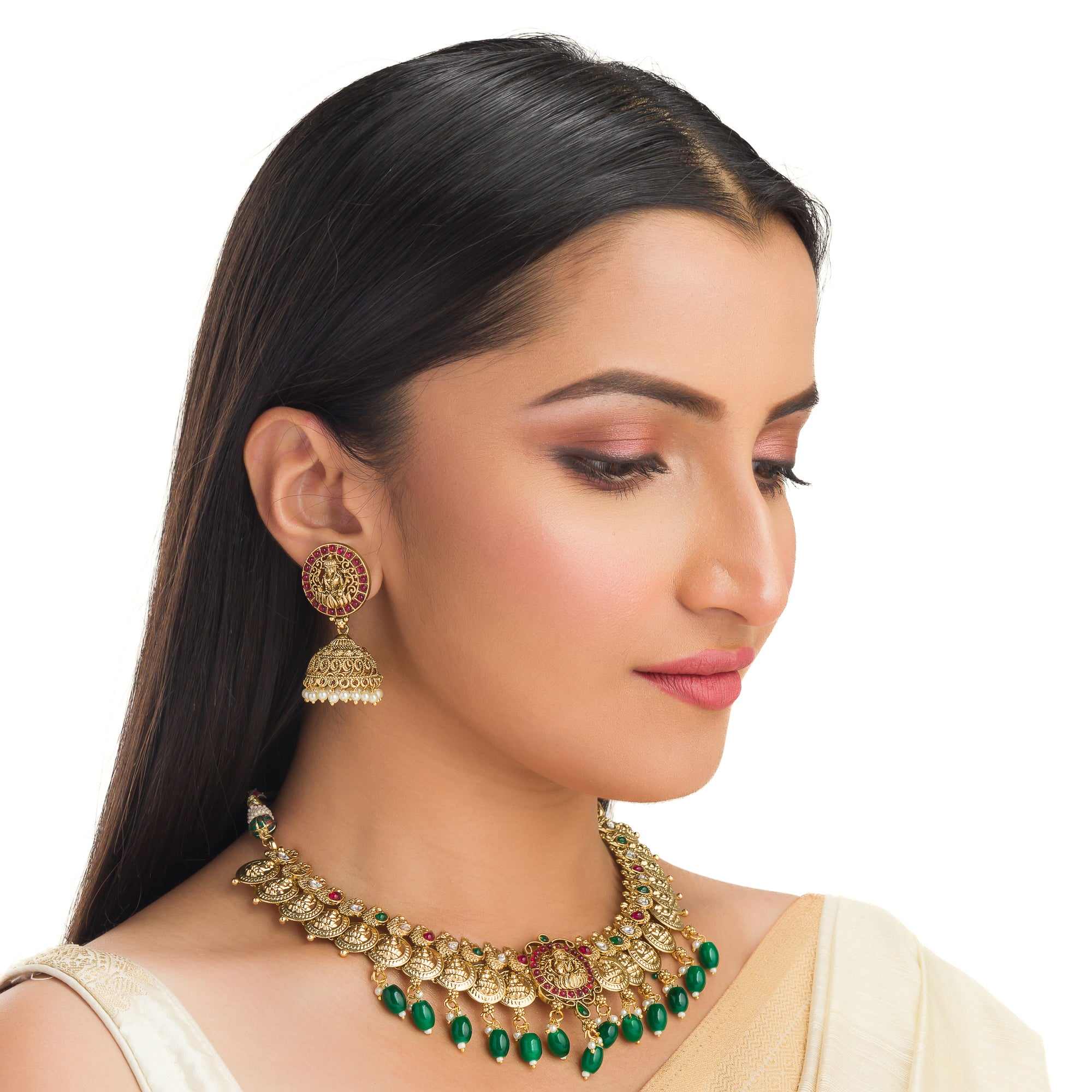 Temple necklace with green Kundan stones radiates vibrant, traditional festival elegance.