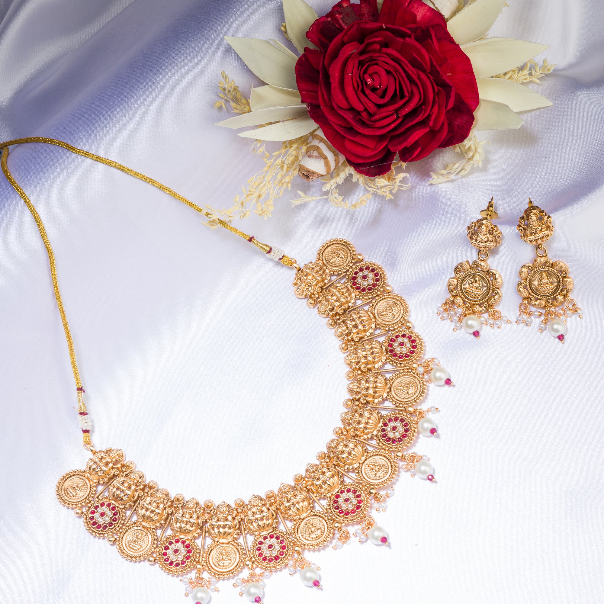 Intricate coin-style temple necklace highlights classic craftsmanship and timeless tradition.