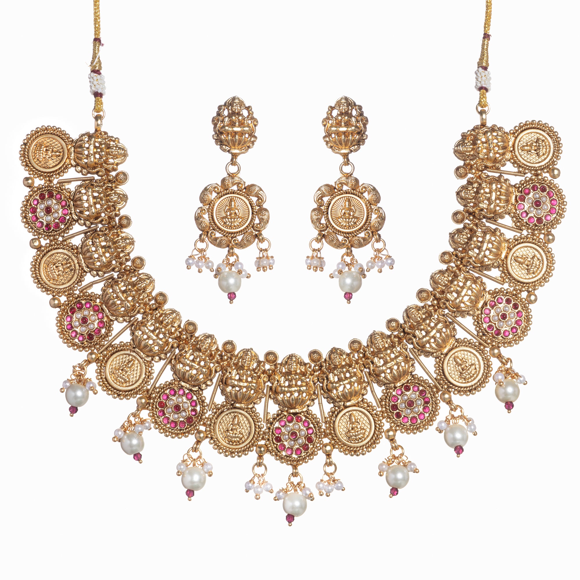 Intricate coin-style temple necklace highlights classic craftsmanship and timeless tradition.