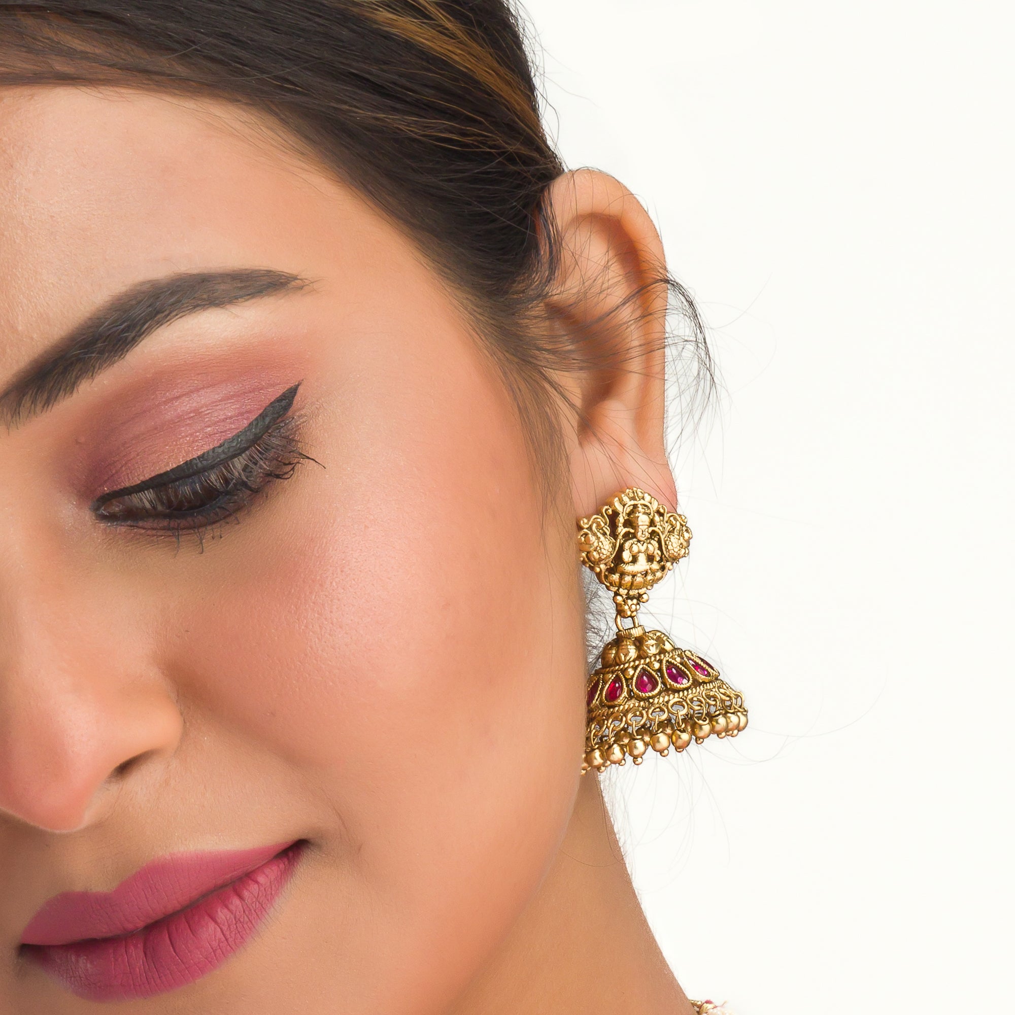 Temple necklace with intricate craftsmanship adds timeless elegance to your festive ensemble.