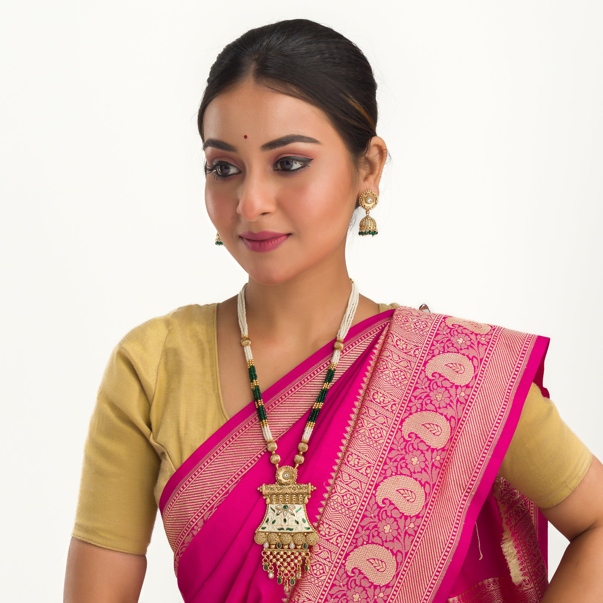 Long temple necklace with maroon pearls radiates classic festival opulence.