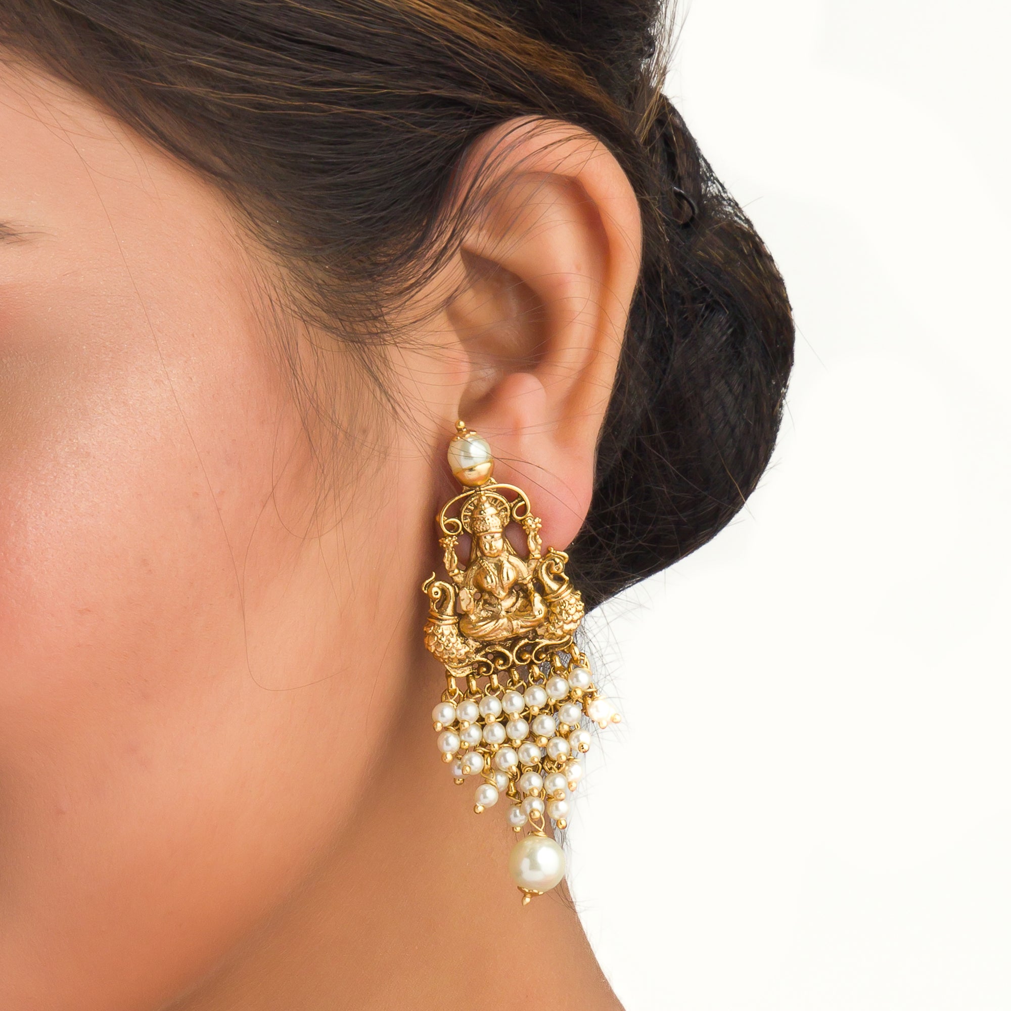 Luxurious temple long necklace with white pearls radiates opulence and refined elegance for festivals.