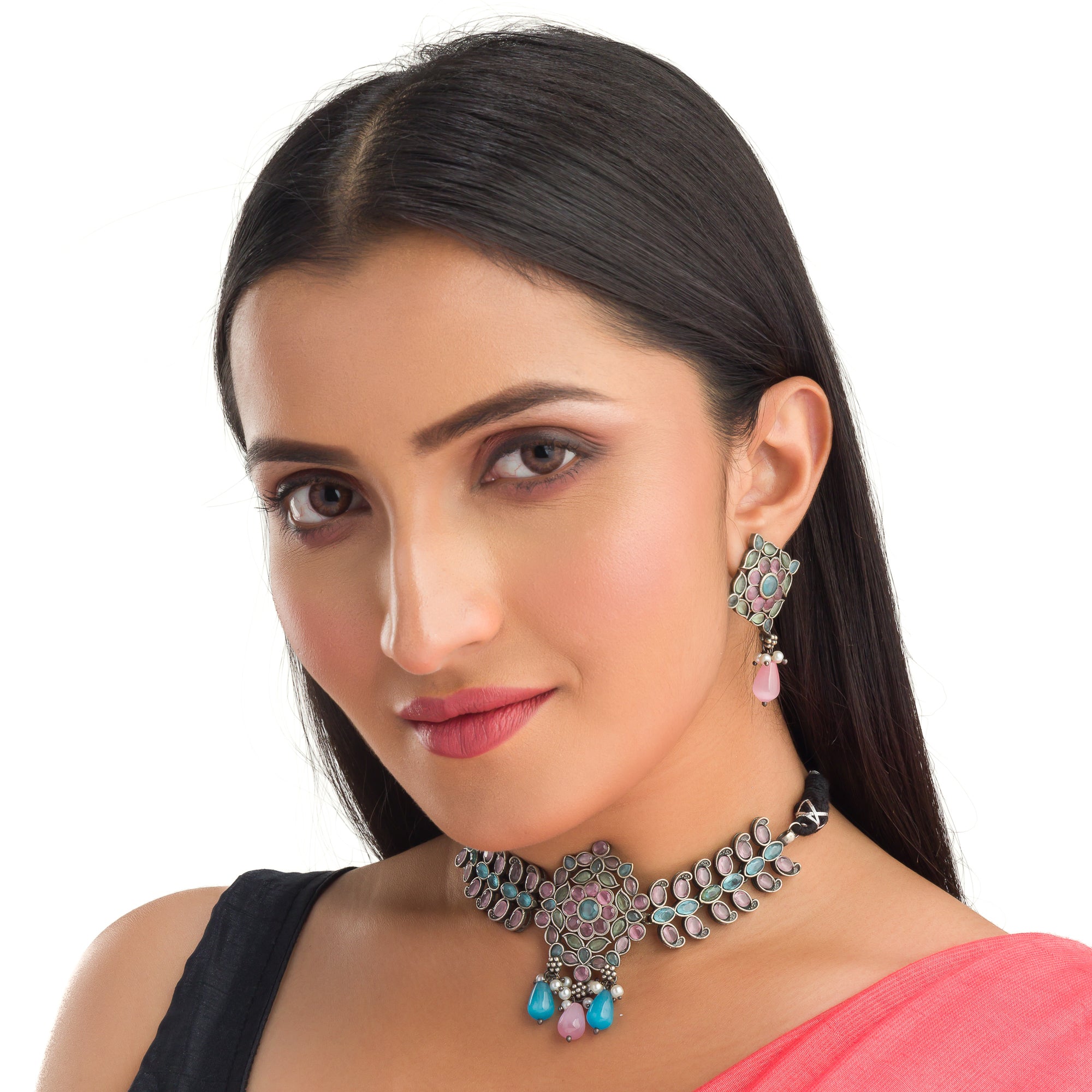 "Oxidized choker with multicolor stones adds a unique and vibrant touch for festive occasions."