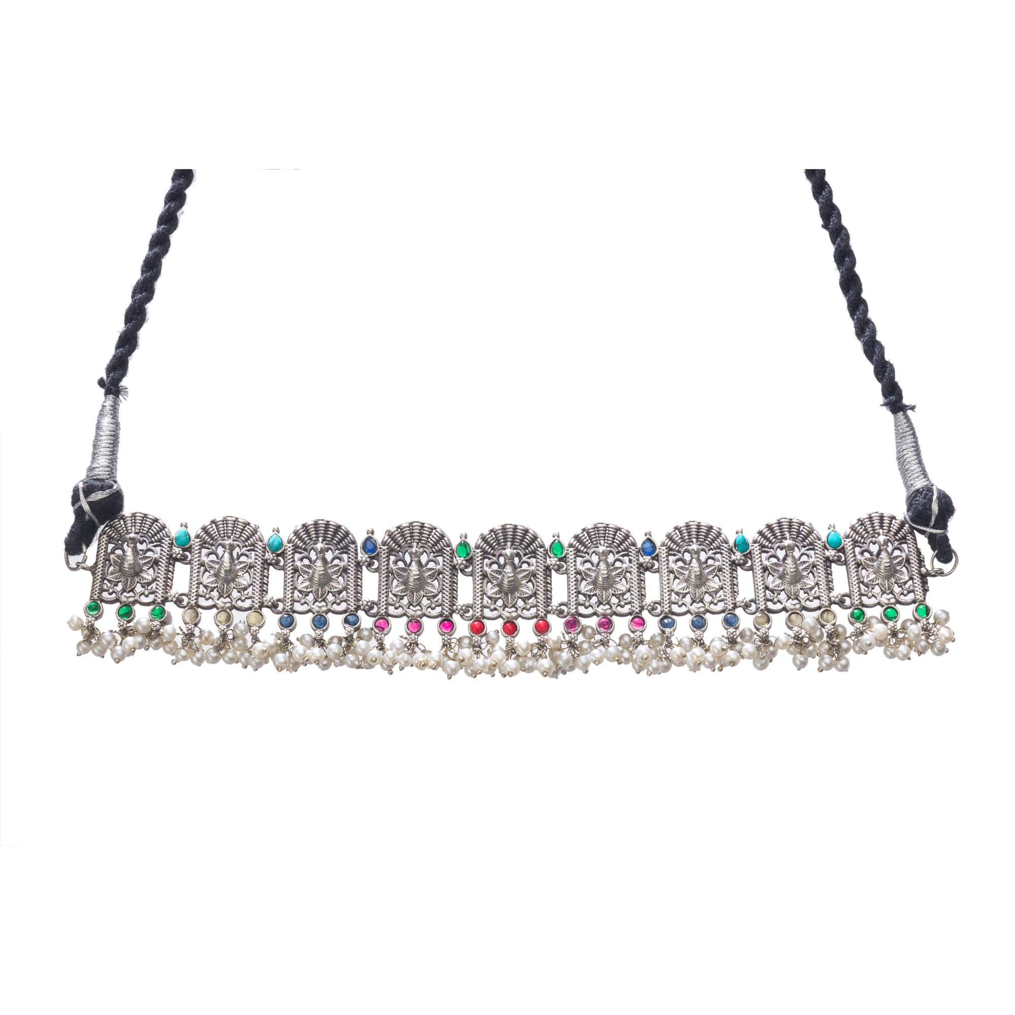 "Oxidized peacock choker with white pearls and colorful stones radiates vintage charm."