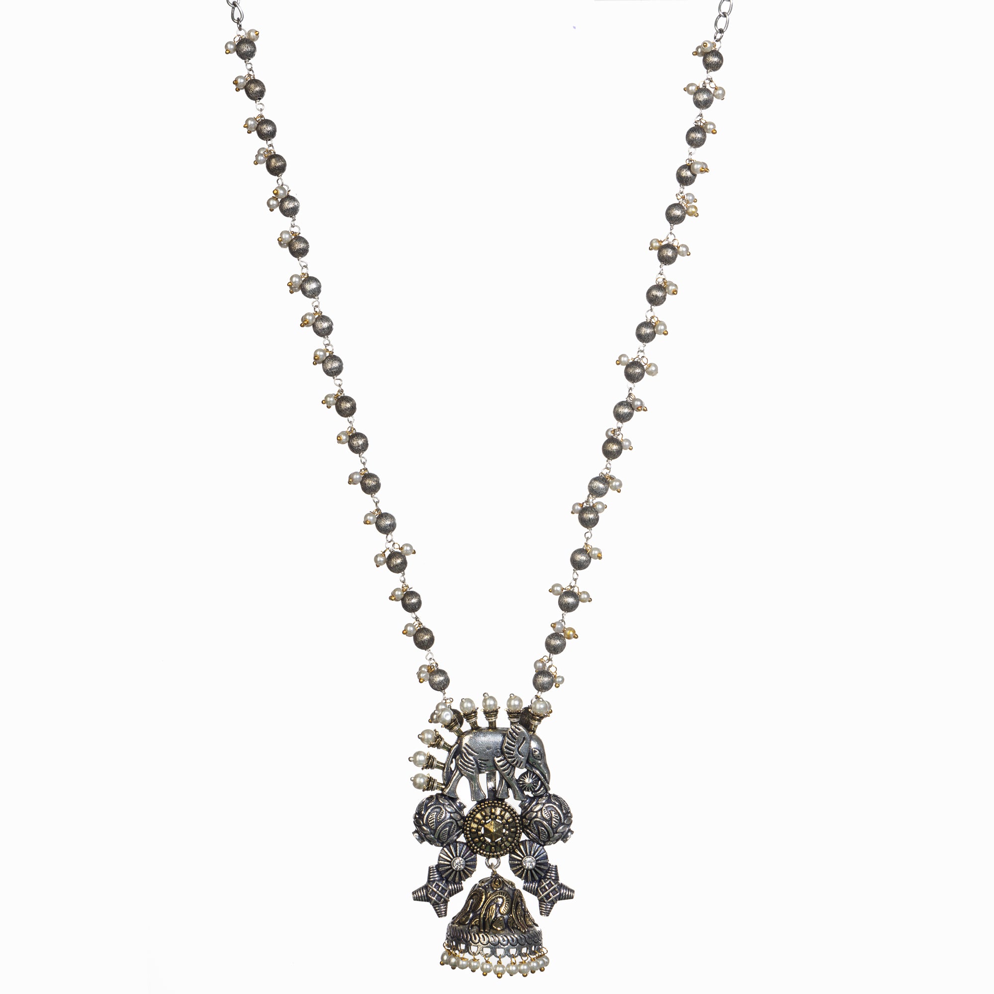 An oxidized dual-colour necklace with elephant and white pearls adds vintage charm and elegance.