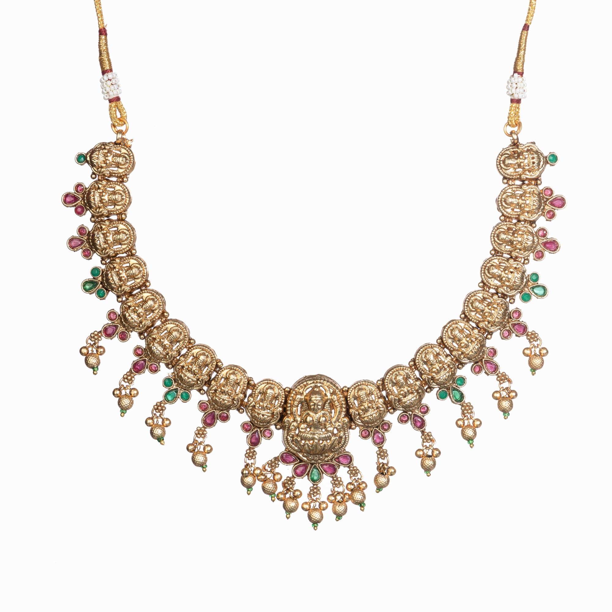 Gold-tone temple necklace set with golden beads offers timeless elegance