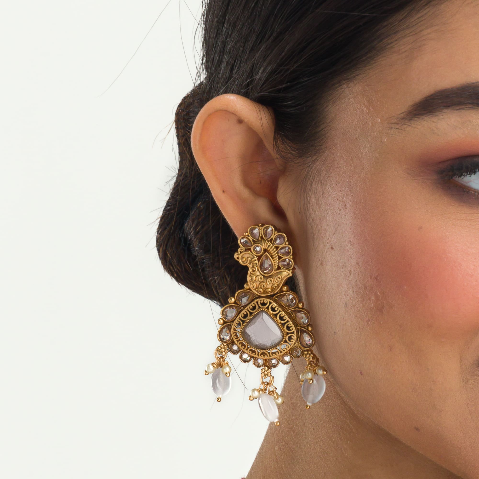 "Gold-tone necklace with grey stones and Kundan for a chic, modern appeal."