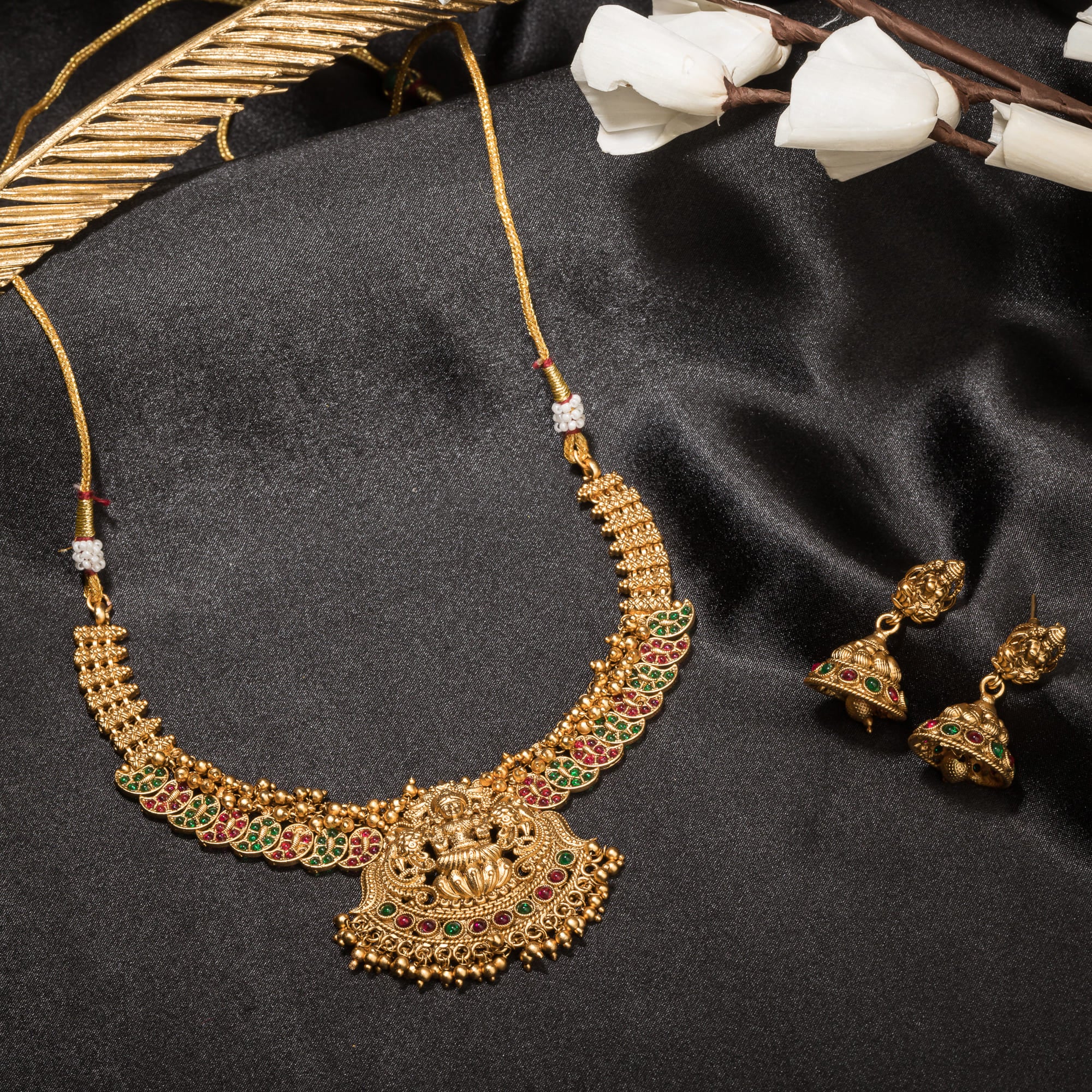 Traditional short temple necklace set, showcasing intricate craftsmanship and charm.
