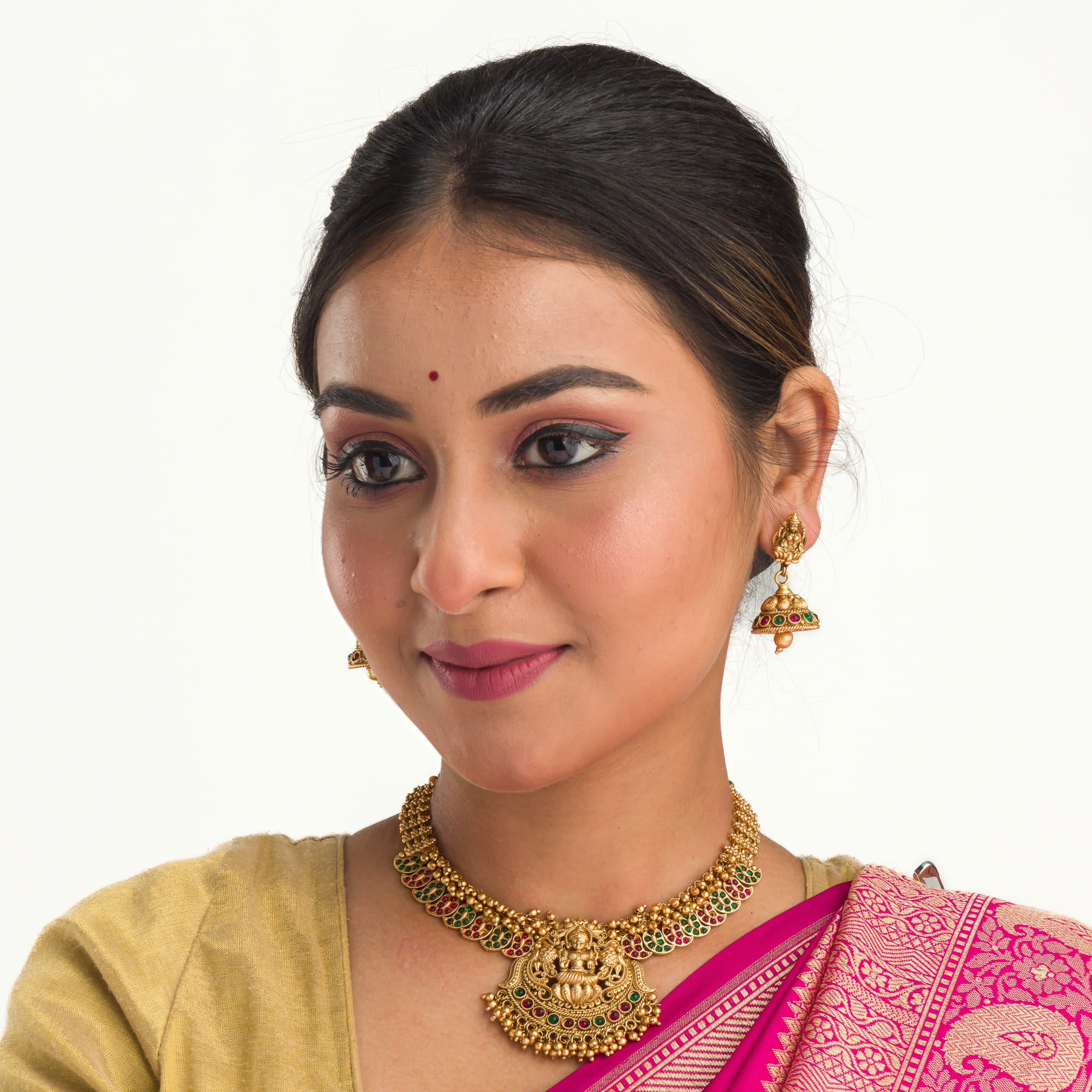 Traditional short temple necklace set, showcasing intricate craftsmanship and charm.