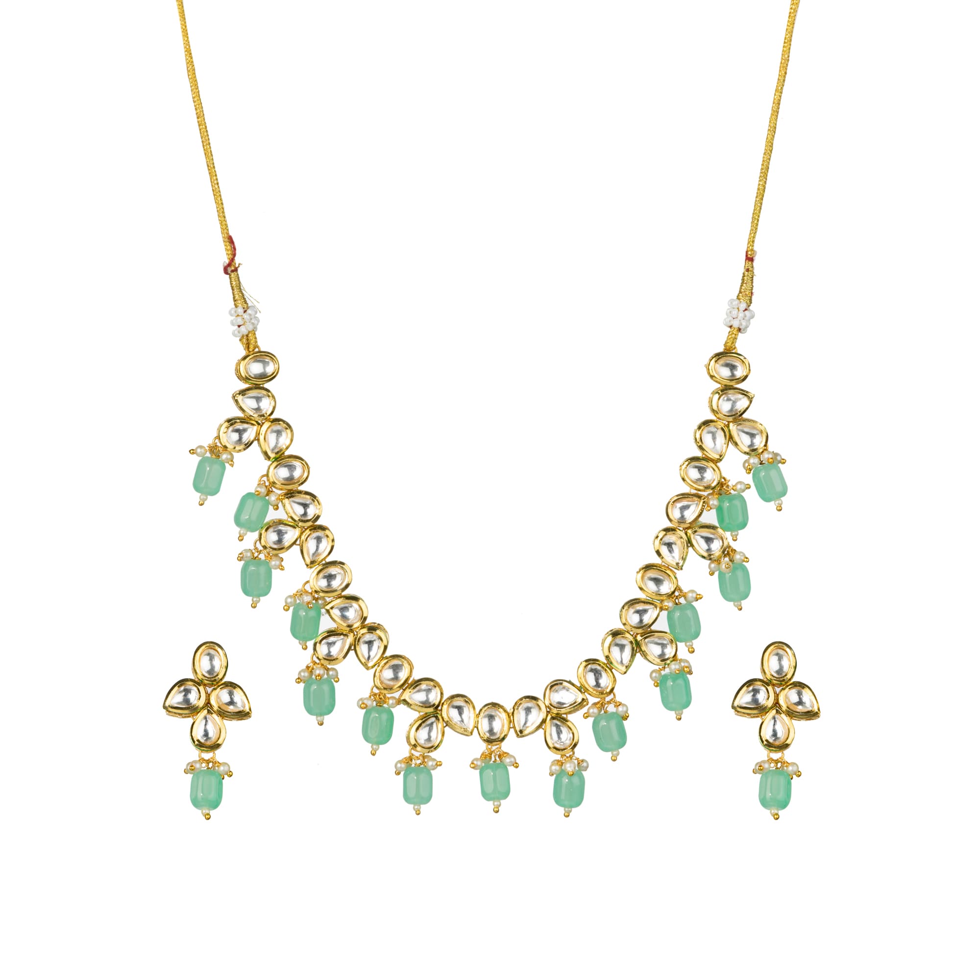 "Light green kundan necklace radiates vibrant, elegant charm."