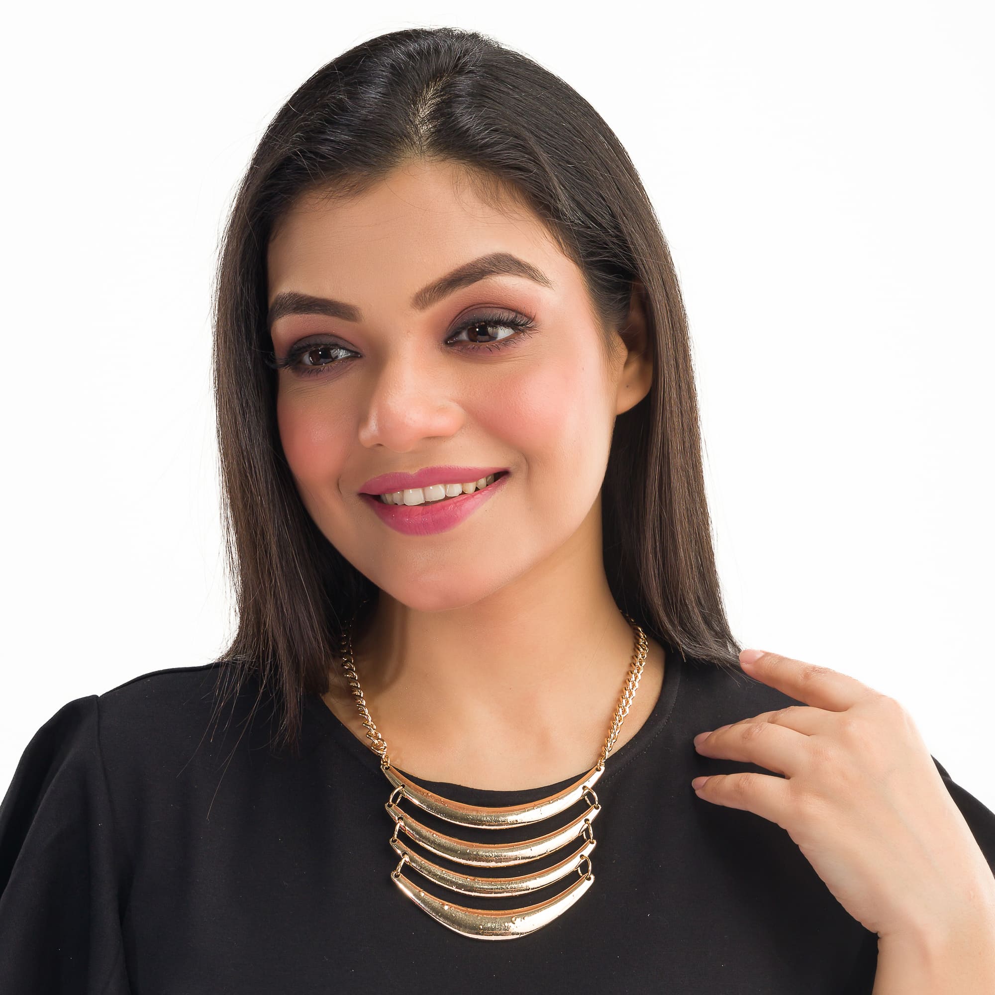 "Trendy gold-tone necklace adds a chic touch to any casual look."