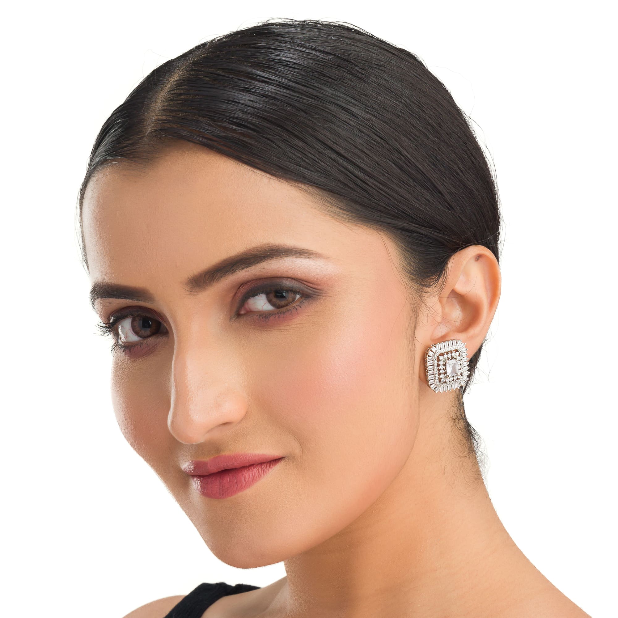 Square zircon stud earrings provide sleek, modern sparkle.