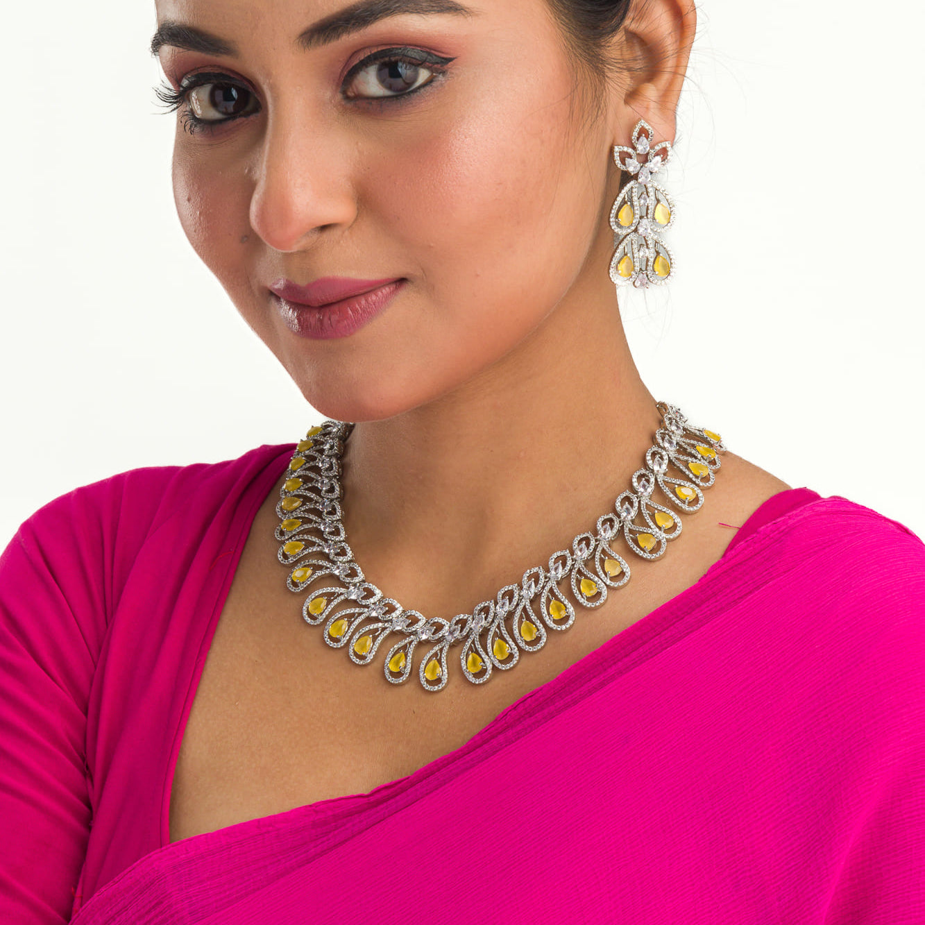 Yellow and white zircon stones create a dazzling contrast in this elegant necklace.