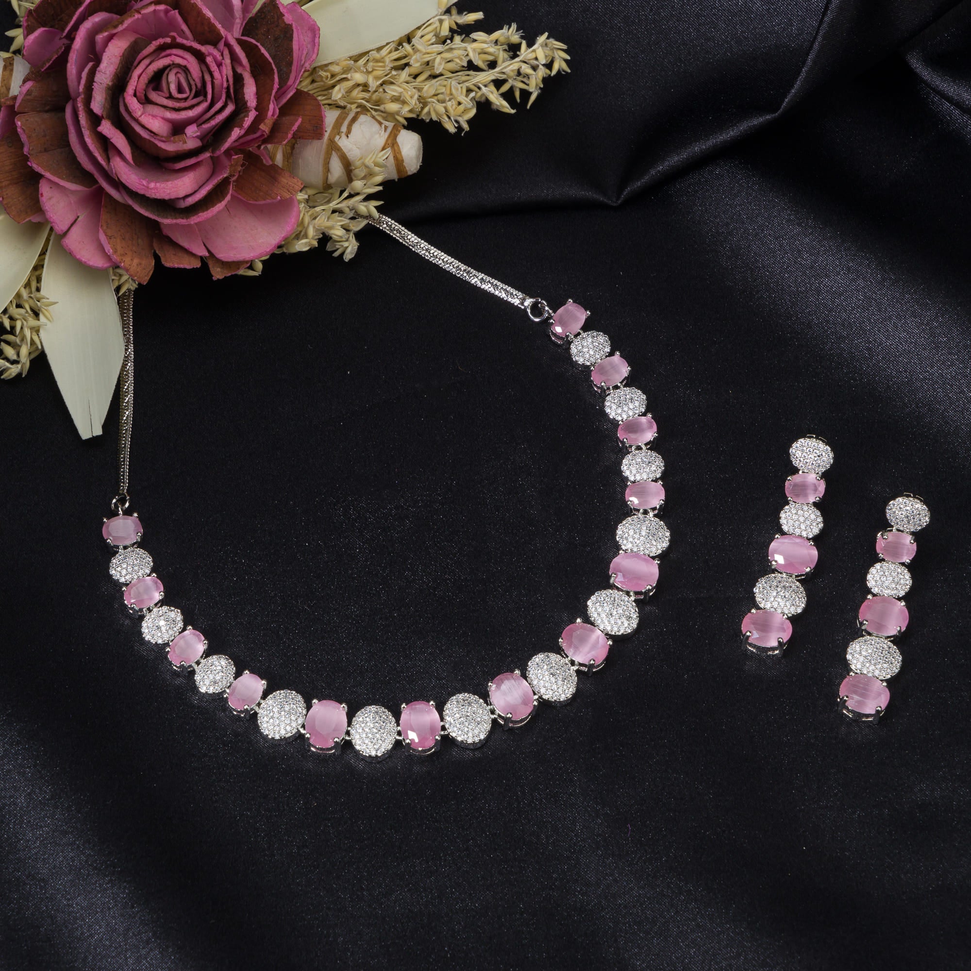 Pink and white zircon stones combine for a vibrant, elegant necklace design.