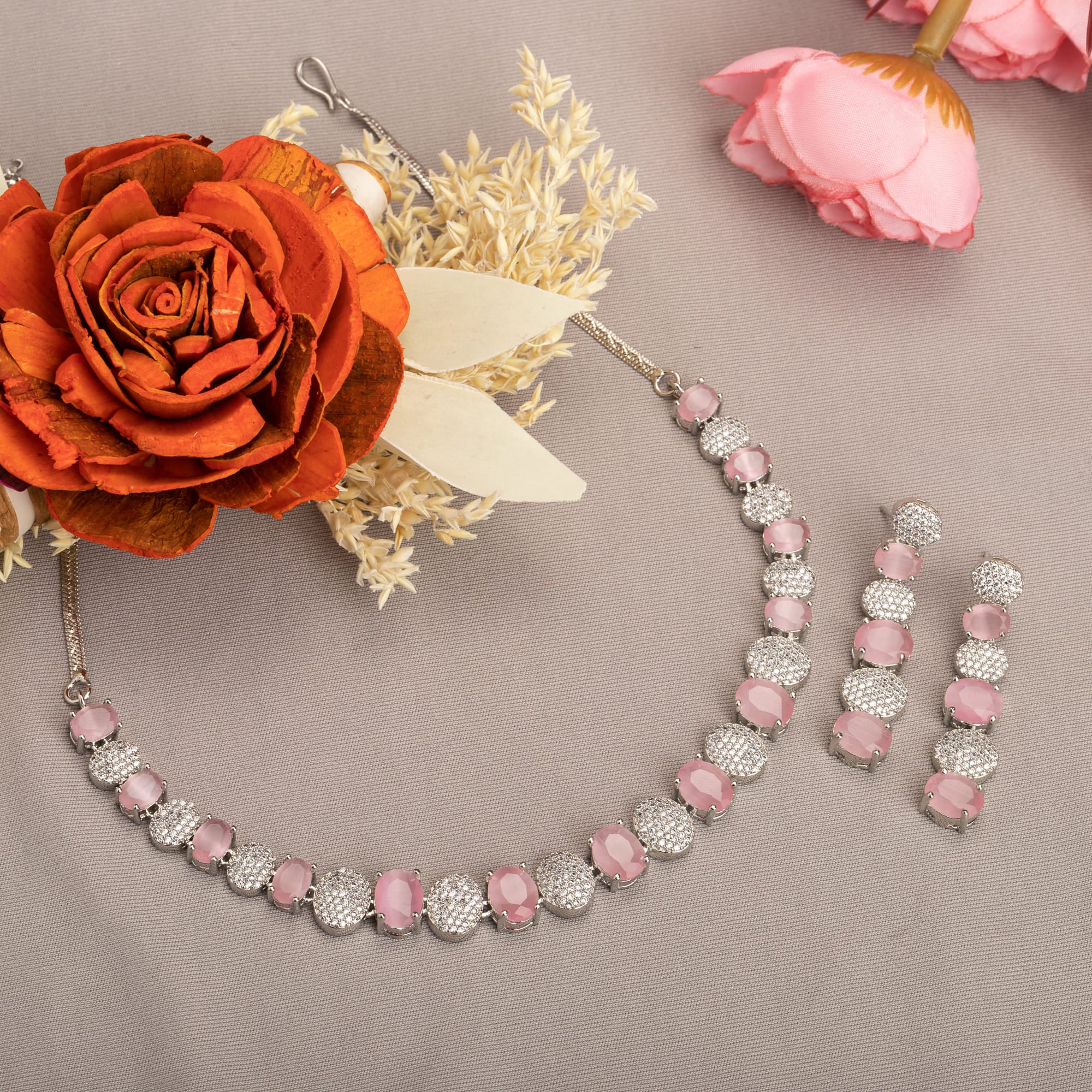 Pink and white zircon stones combine for a vibrant, elegant necklace design.