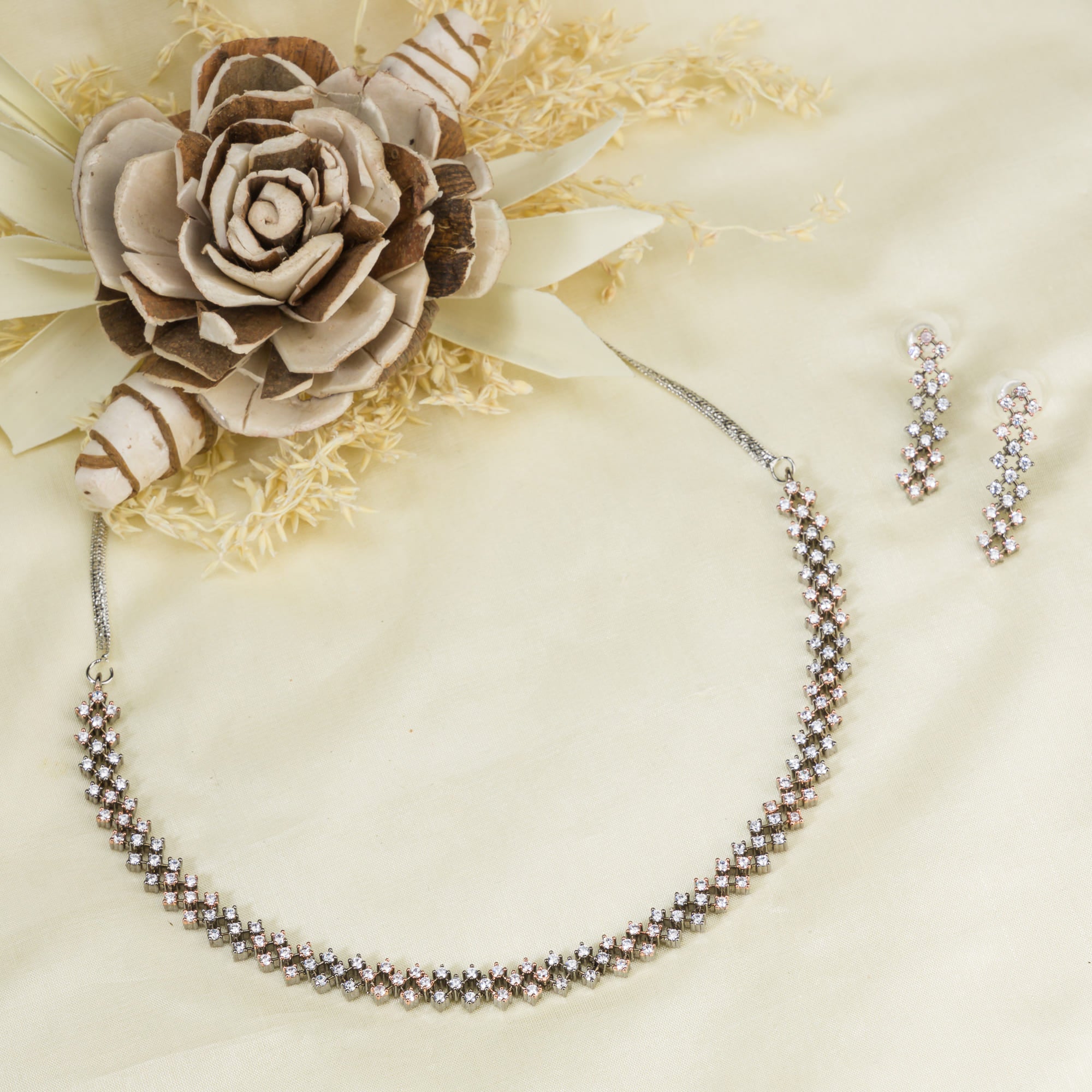 "Zircon short necklace sparkles with elegant refinement and shine."