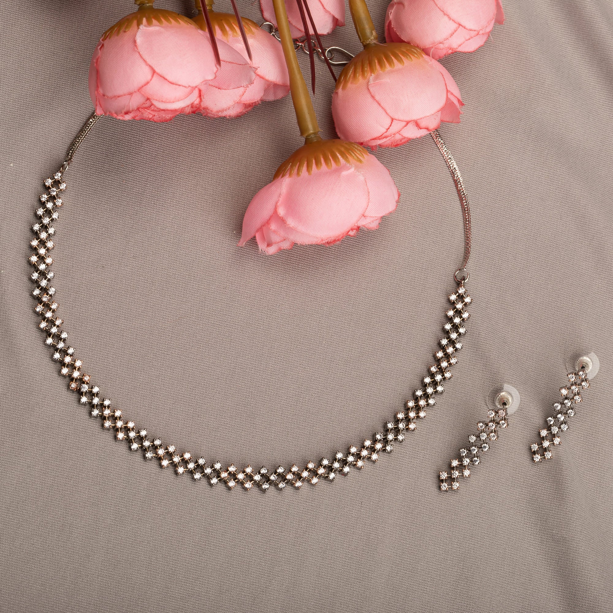 "Zircon short necklace sparkles with elegant refinement and shine."