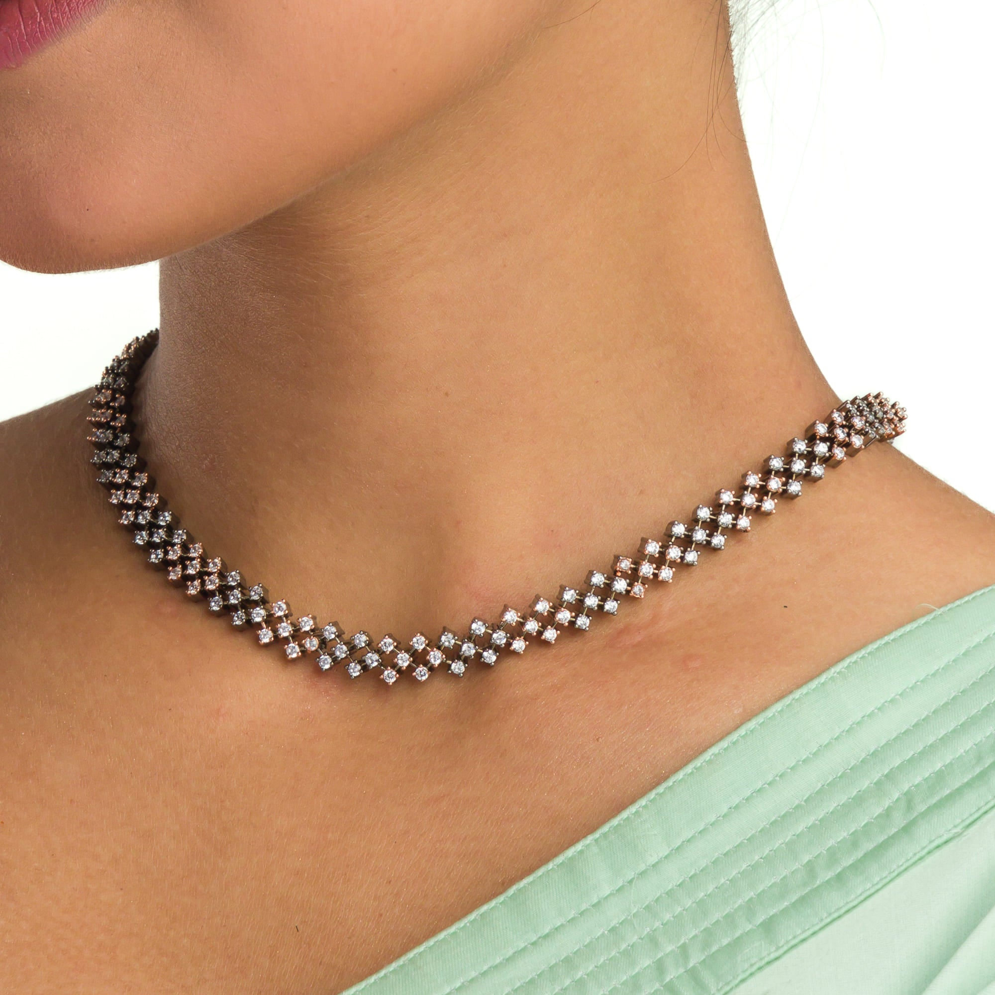 "Zircon short necklace sparkles with elegant refinement and shine."