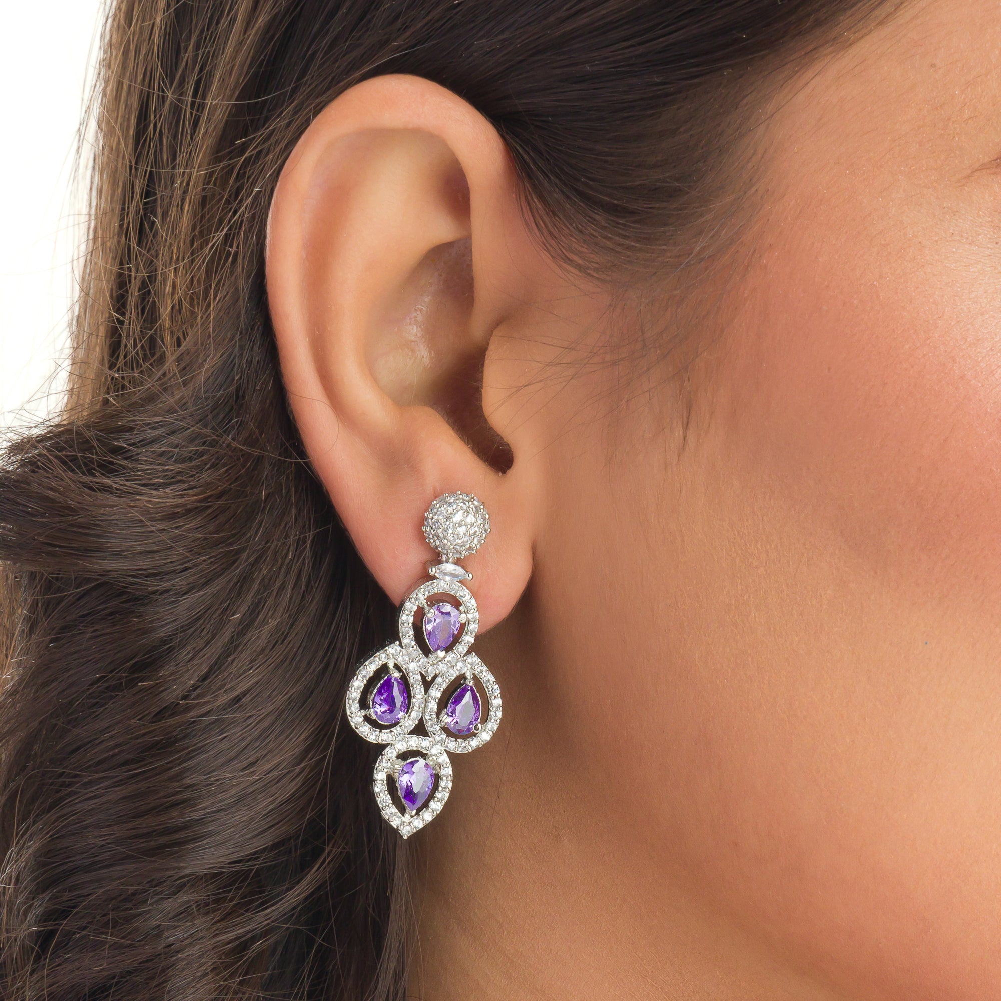 Violet zircon necklace adds a rich, sophisticated touch to festive looks.