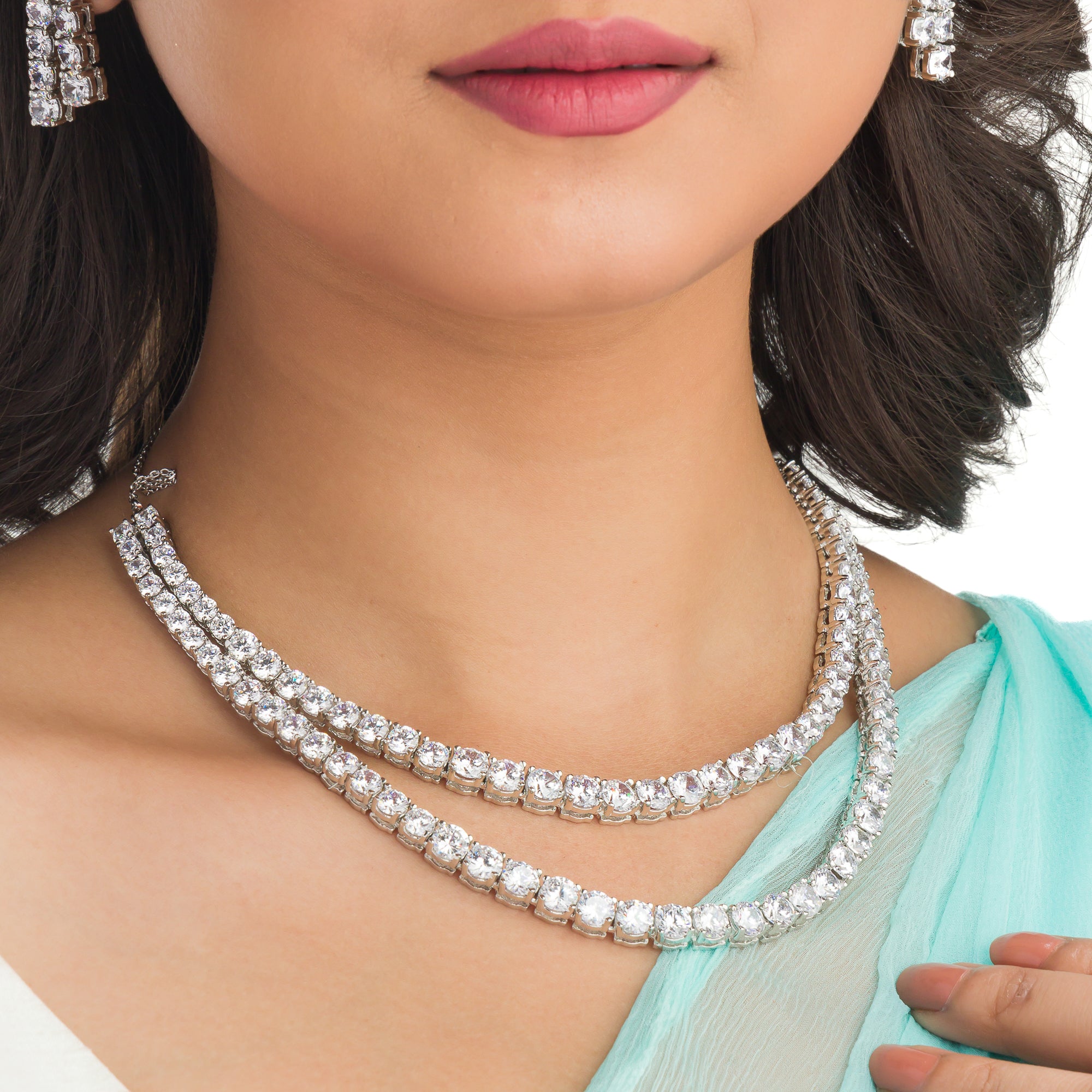 Double-layer zircon necklace adds brilliance and sophistication for a party look.