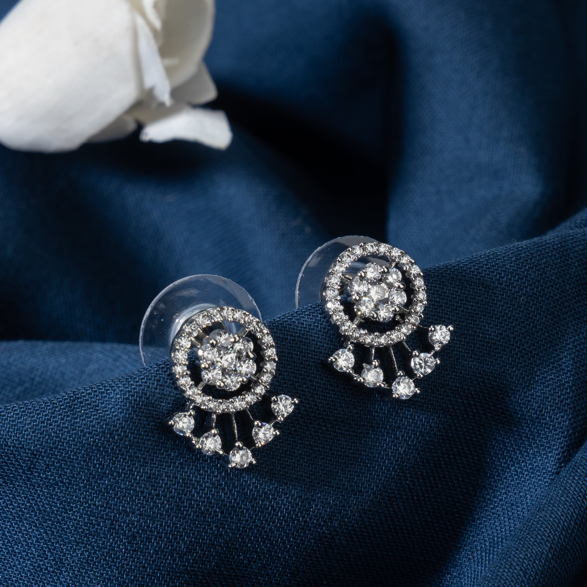 Sleek silver zircon studs offer a trendy and elegant style for daily wear.