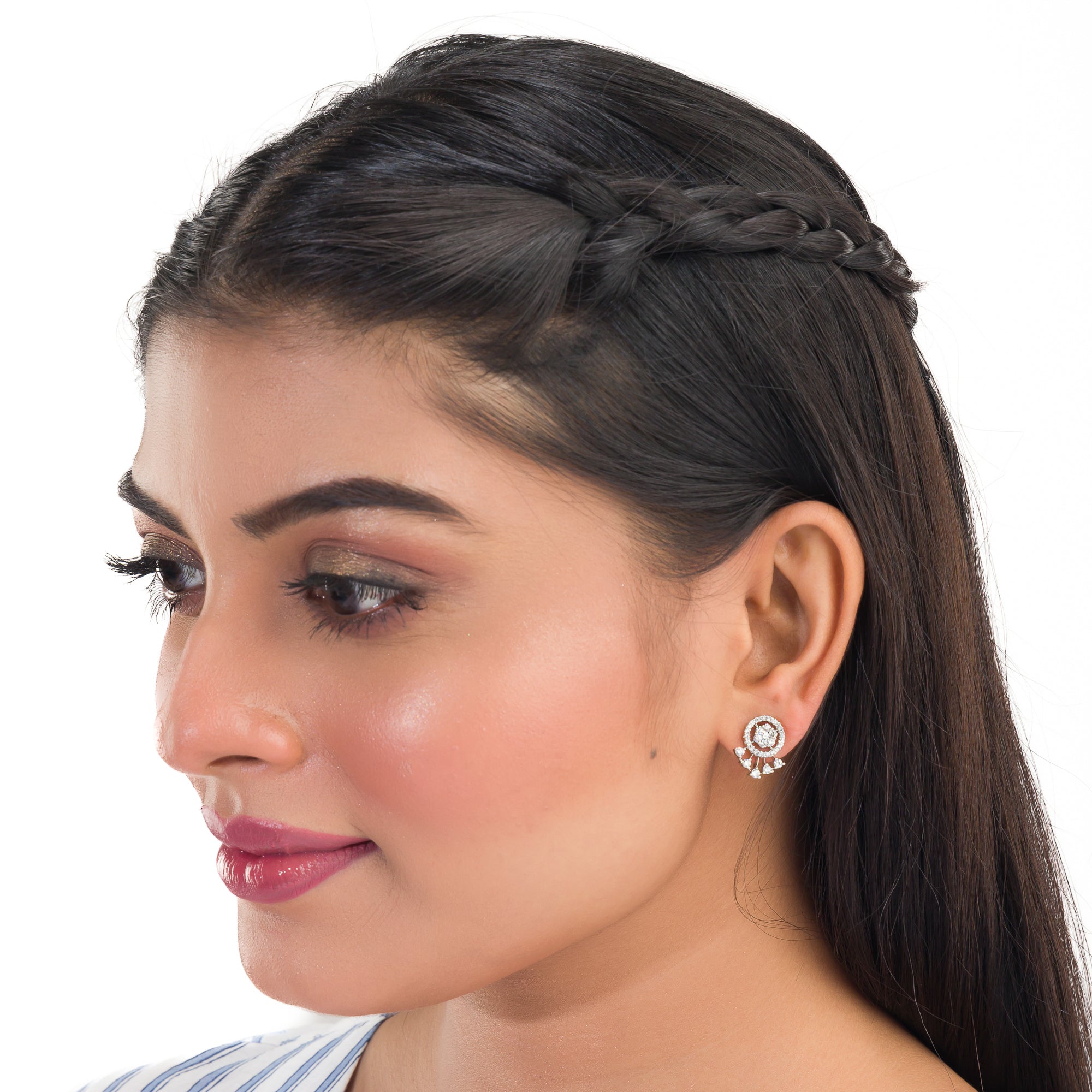 Sleek silver zircon studs offer a trendy and elegant style for daily wear.