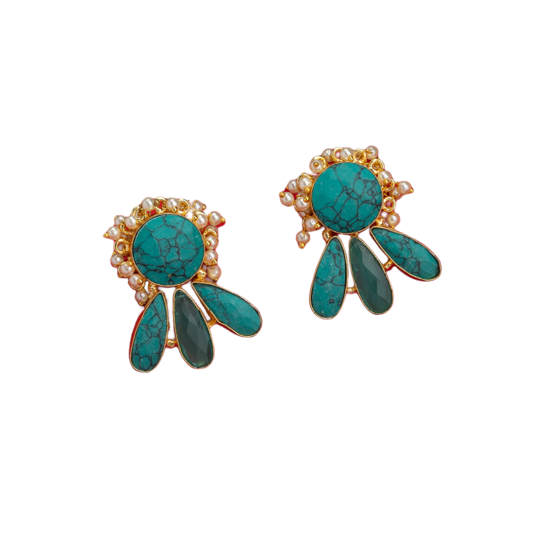 Blue gold-tone earrings with a pearl drop offer classic elegance and vibrant color.