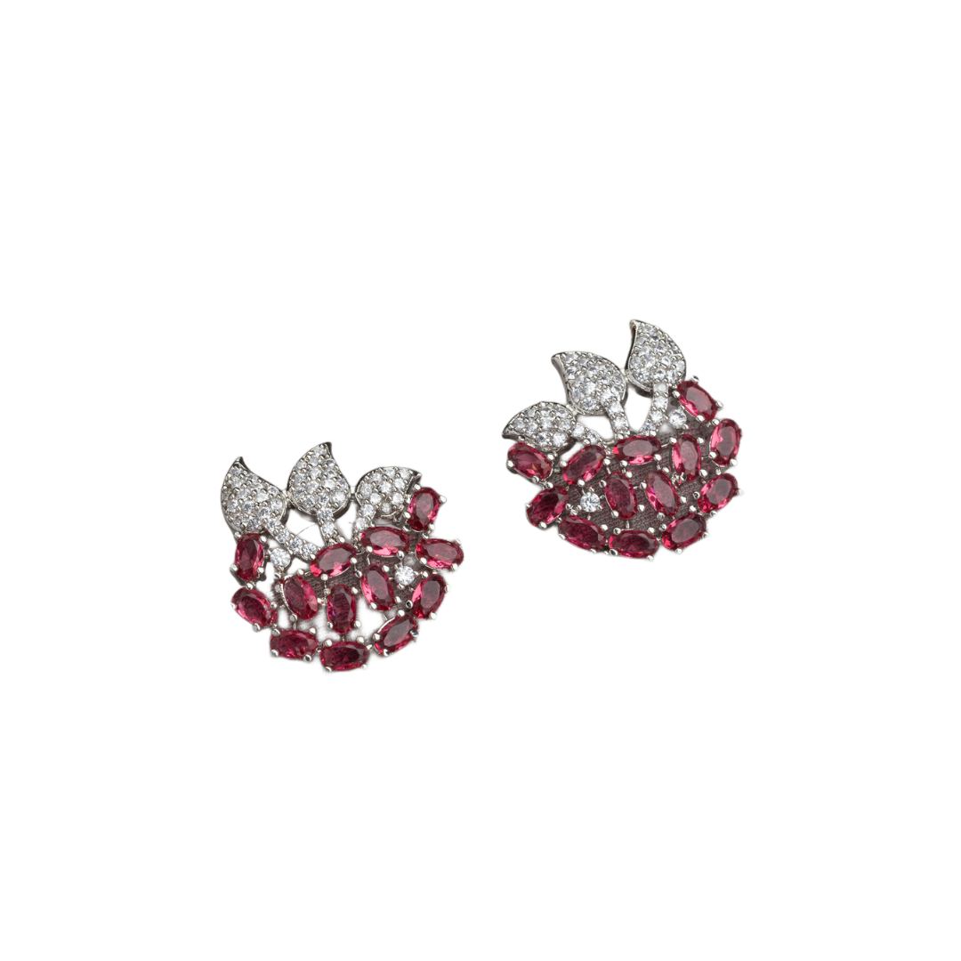 Pink zircon stud earrings exude bold elegance and sparkling charm.