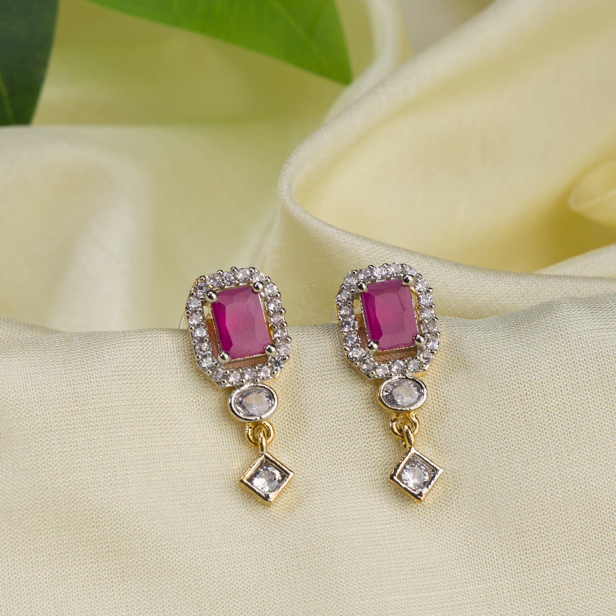 Elegant pink zircon stud earrings, perfect for daily wear and festive occasions