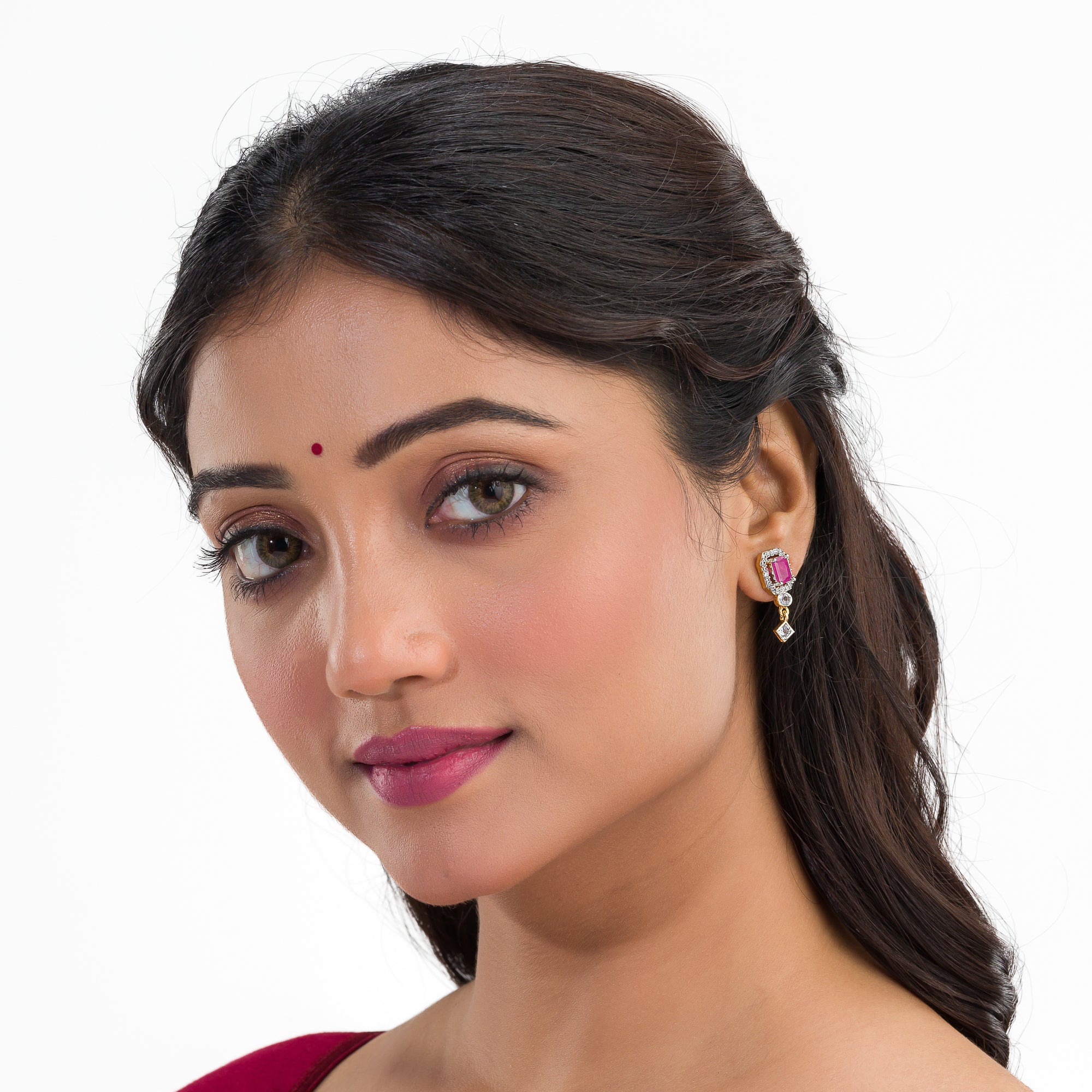 Elegant pink zircon stud earrings, perfect for daily wear and festive occasions