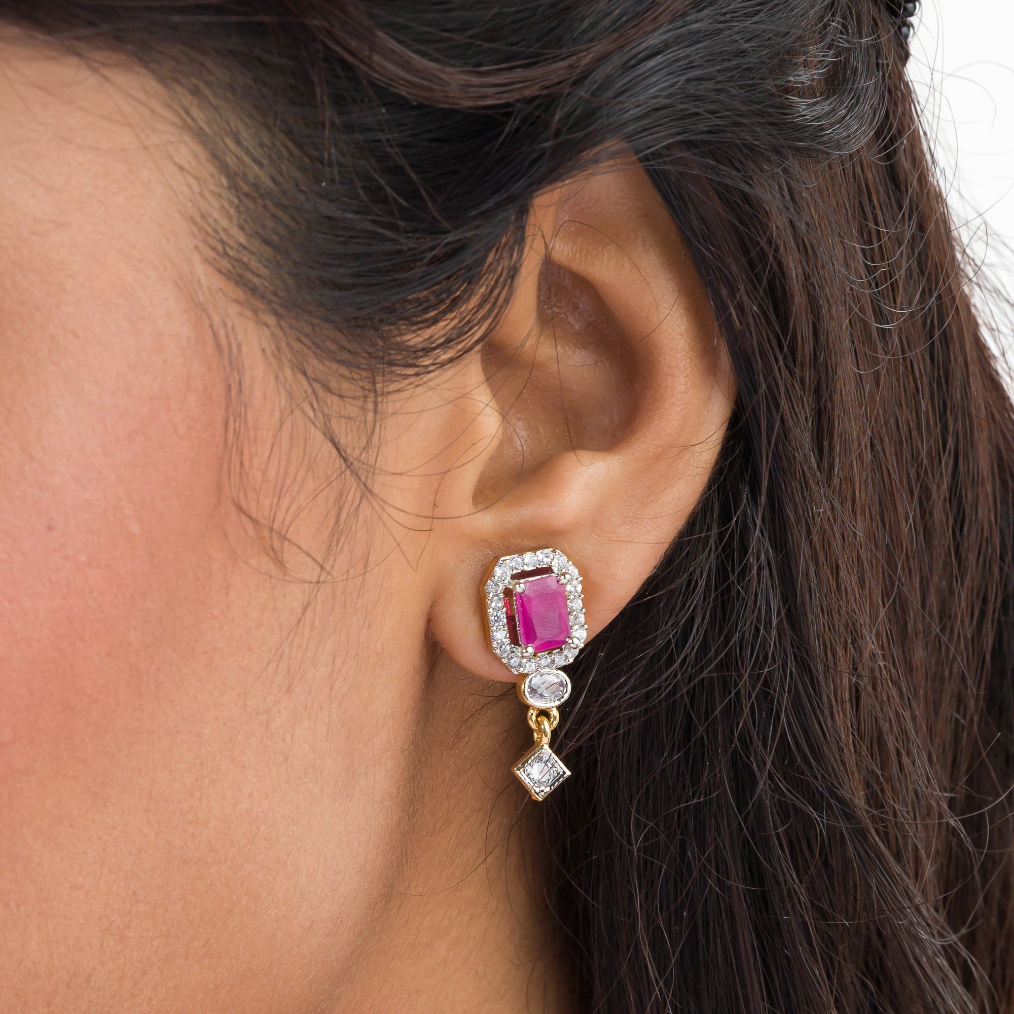 Elegant pink zircon stud earrings, perfect for daily wear and festive occasions