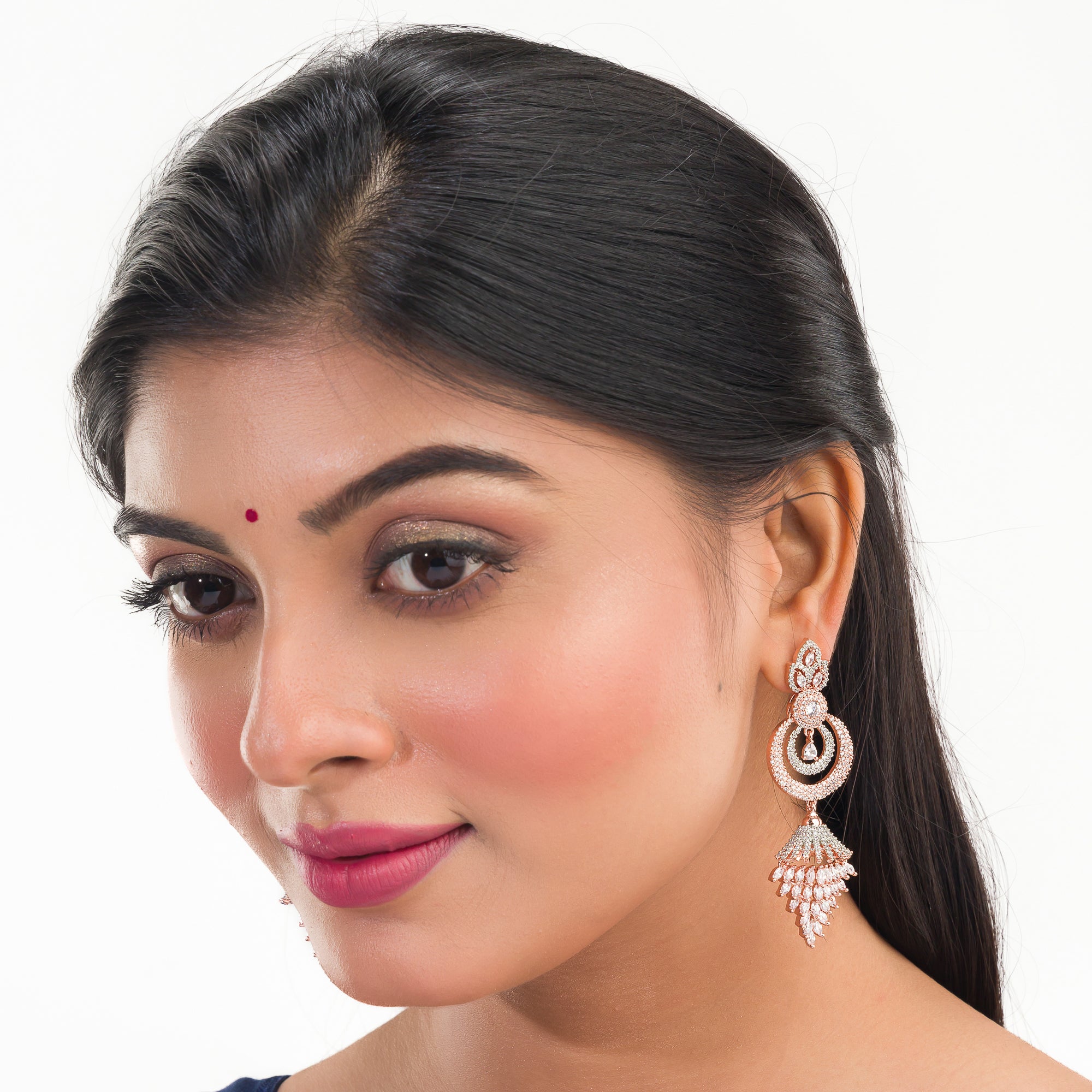 Sparkling zircon dangler earrings in rose gold, perfect for party elegance.