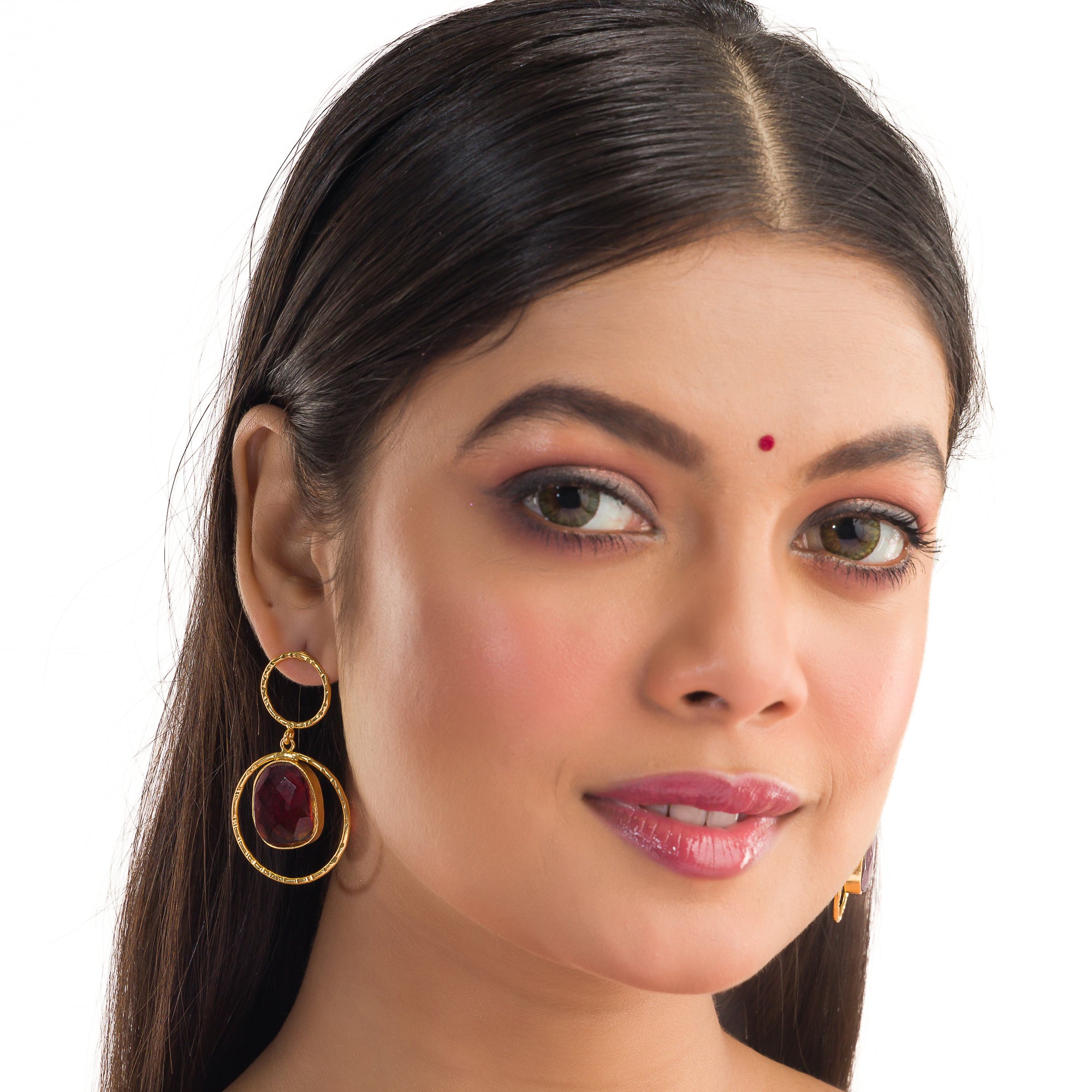 Bold gold-tone dangler earrings with red stone for a striking, luxurious look