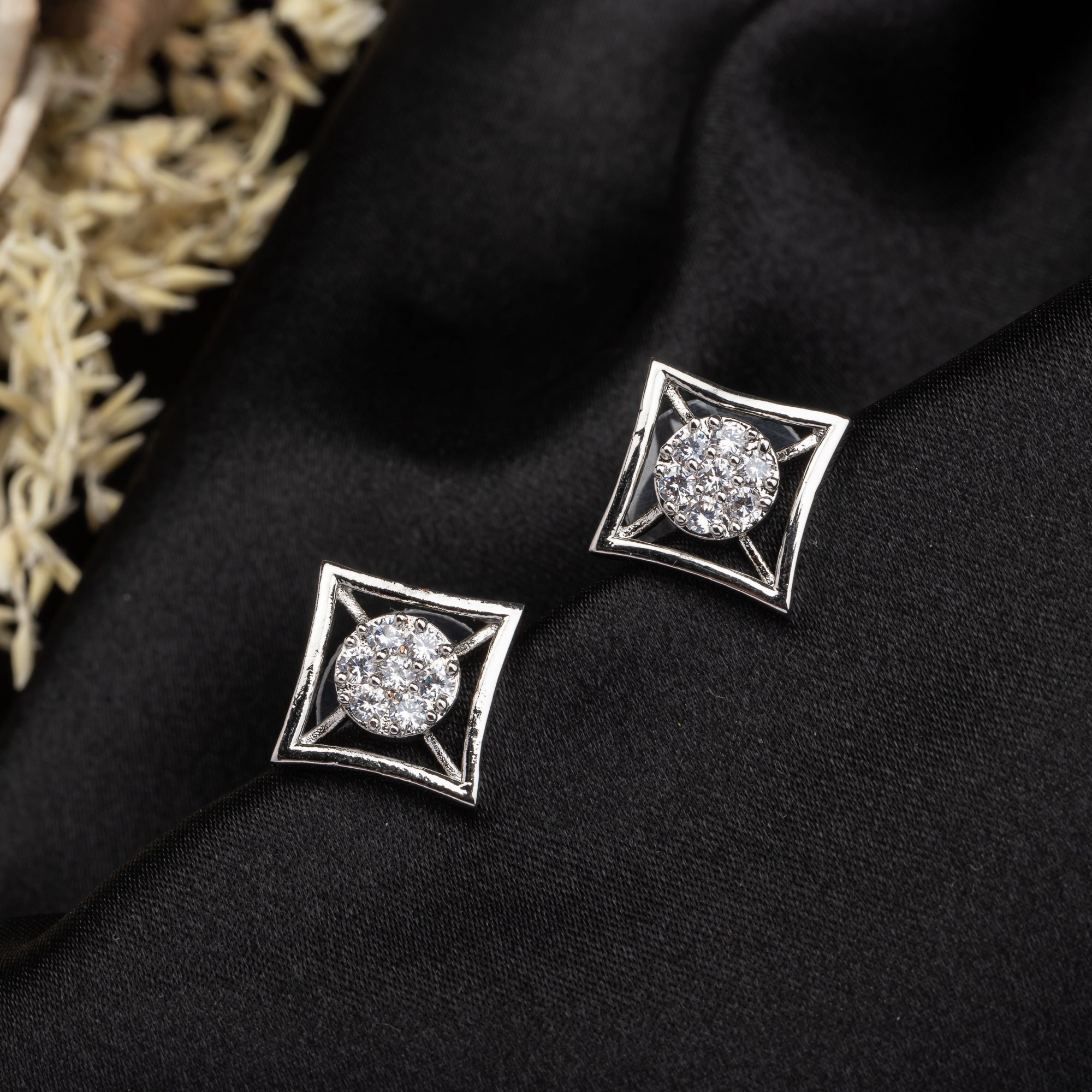 "Silver square zircon earrings bring modern sophistication and subtle sparkle for office wear."