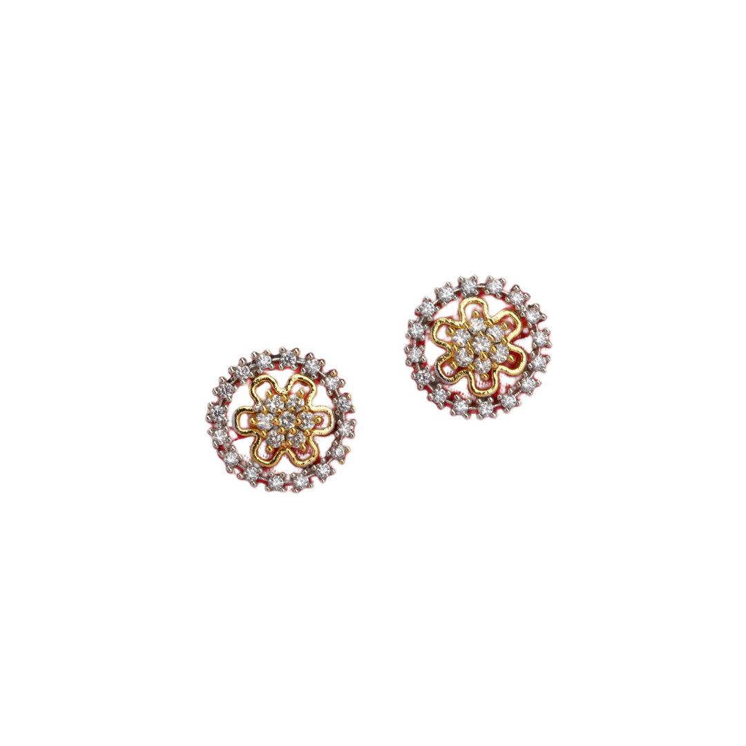"Zircon studs with gold polish offer timeless sparkle and a luxurious touch for casual occasions."