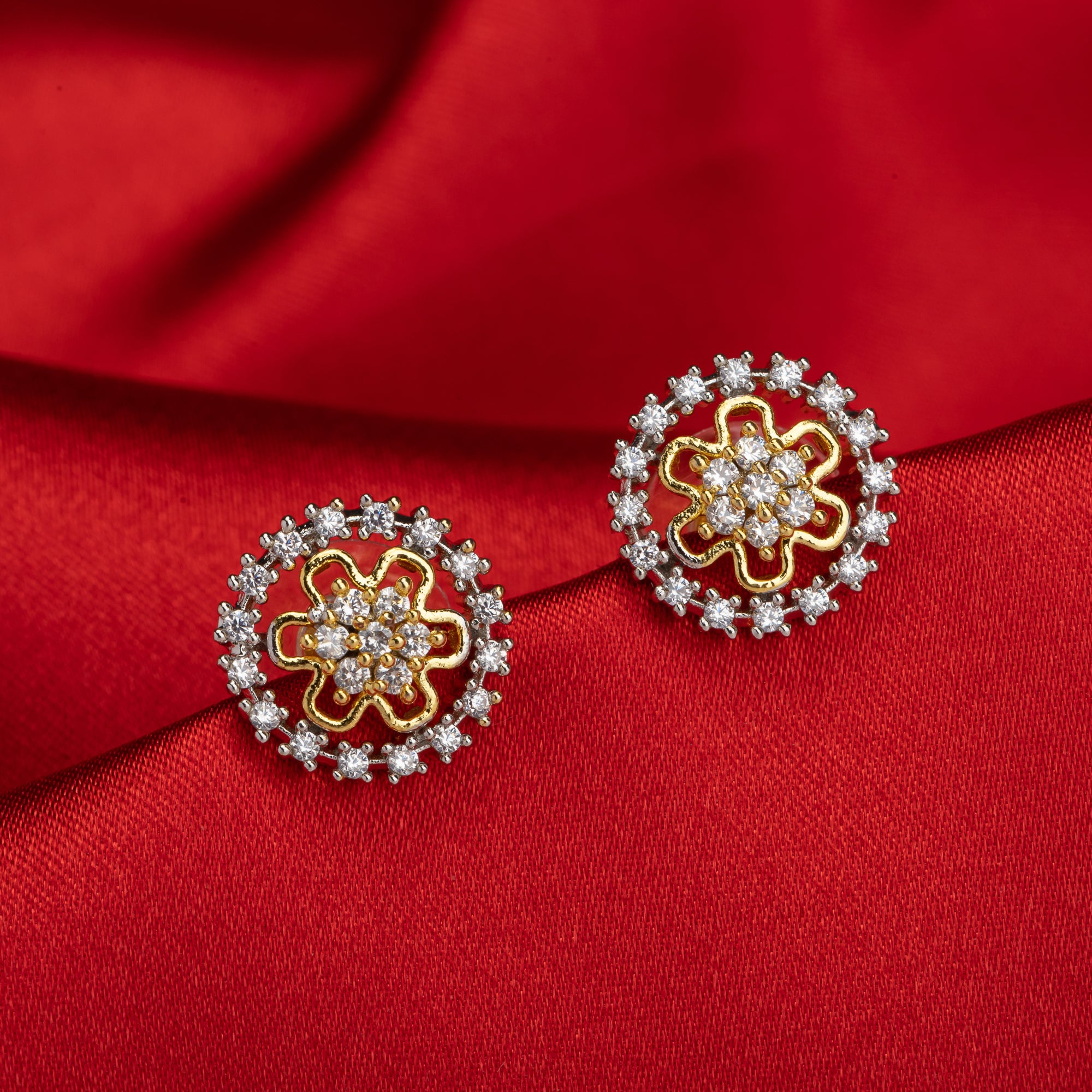 "Zircon studs with gold polish offer timeless sparkle and a luxurious touch for casual occasions."