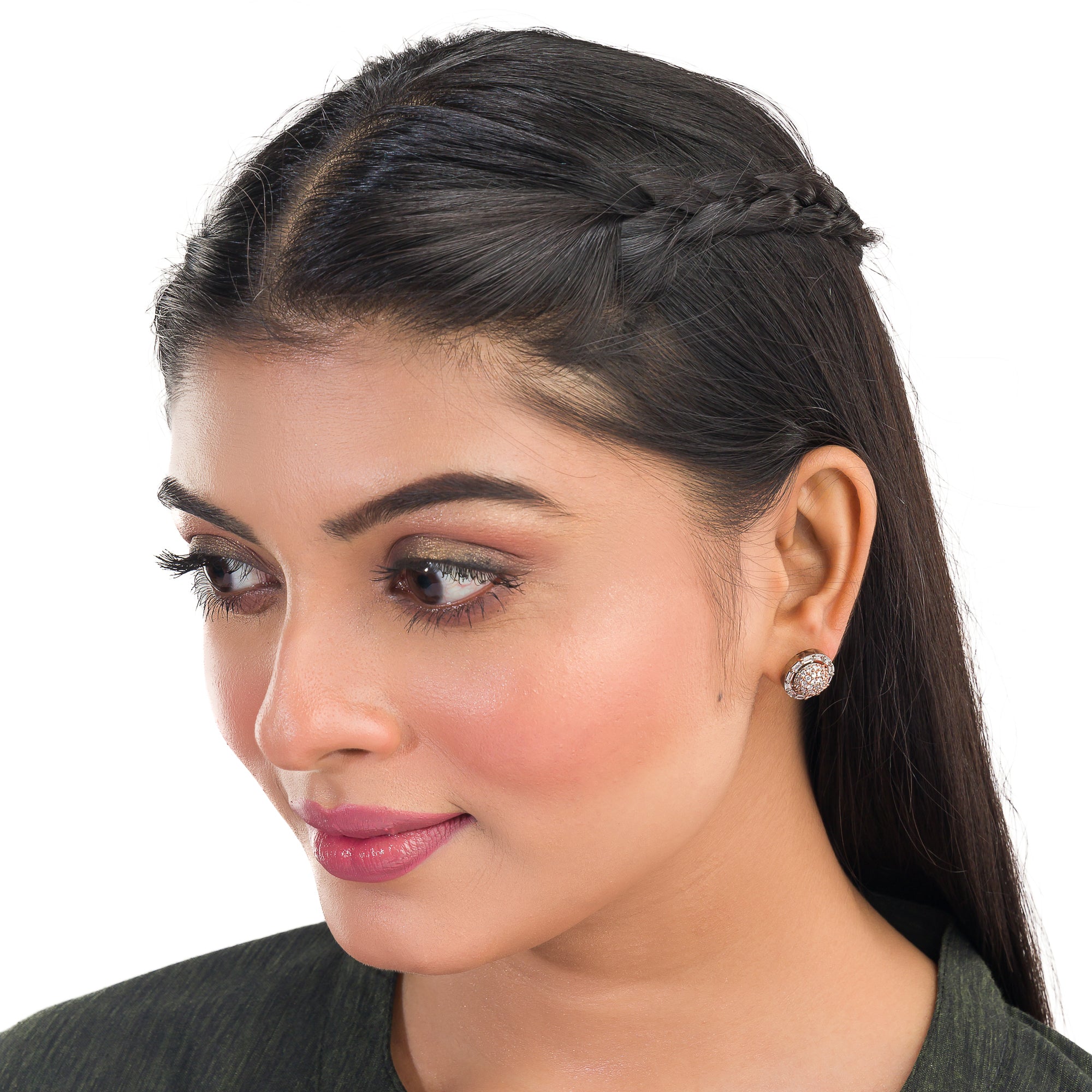 "Silver zircon studs with golden beads bring a subtle, stylish touch to casual elegance."