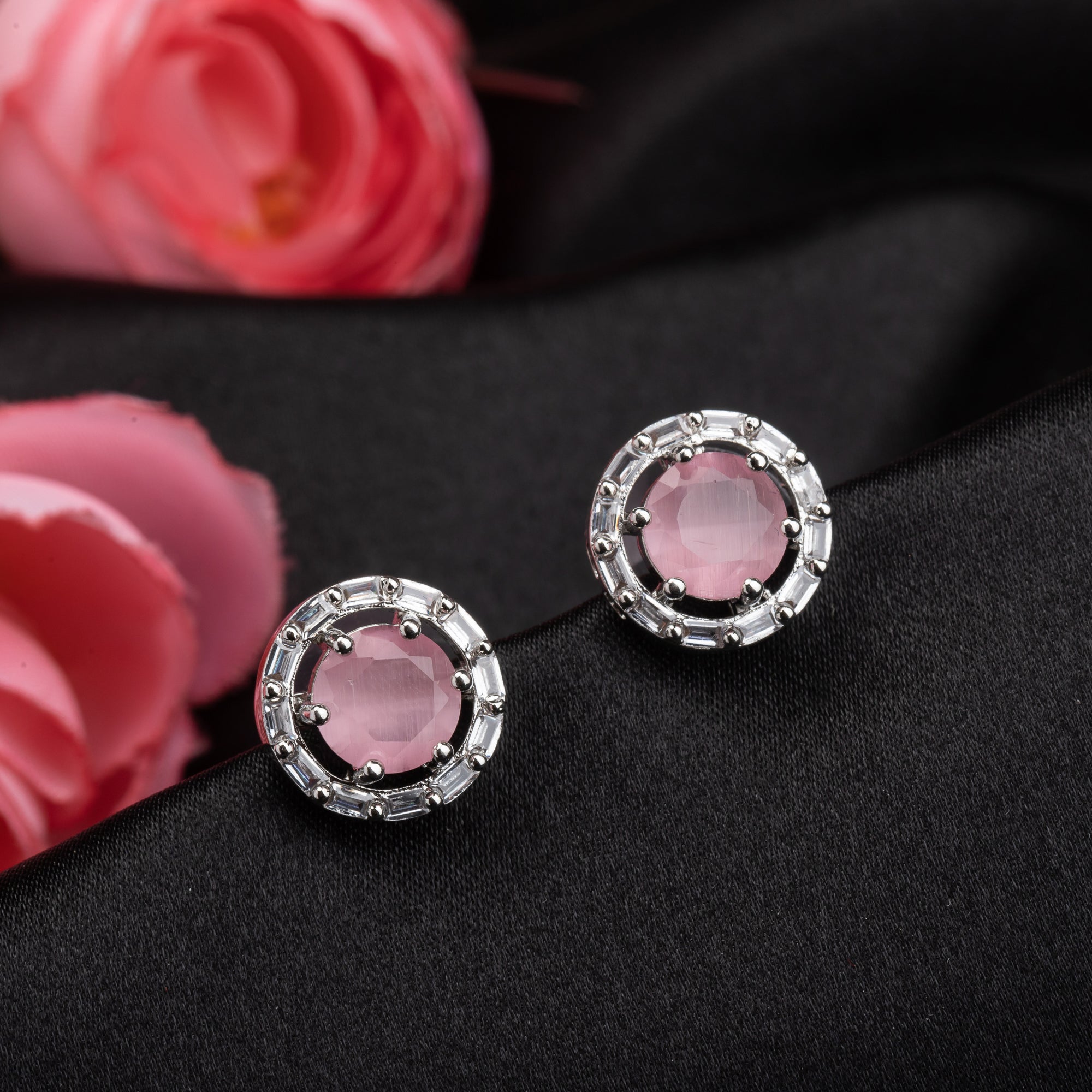 "Pink zircon stud earrings bring stunning sparkle and a vibrant, elegant touch to any look."