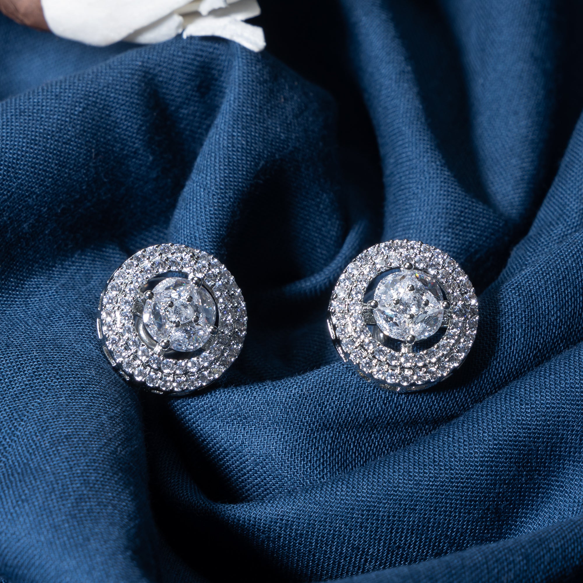 "Timeless zircon stud earrings offer brilliant sparkle and versatile elegance for any occasion."
