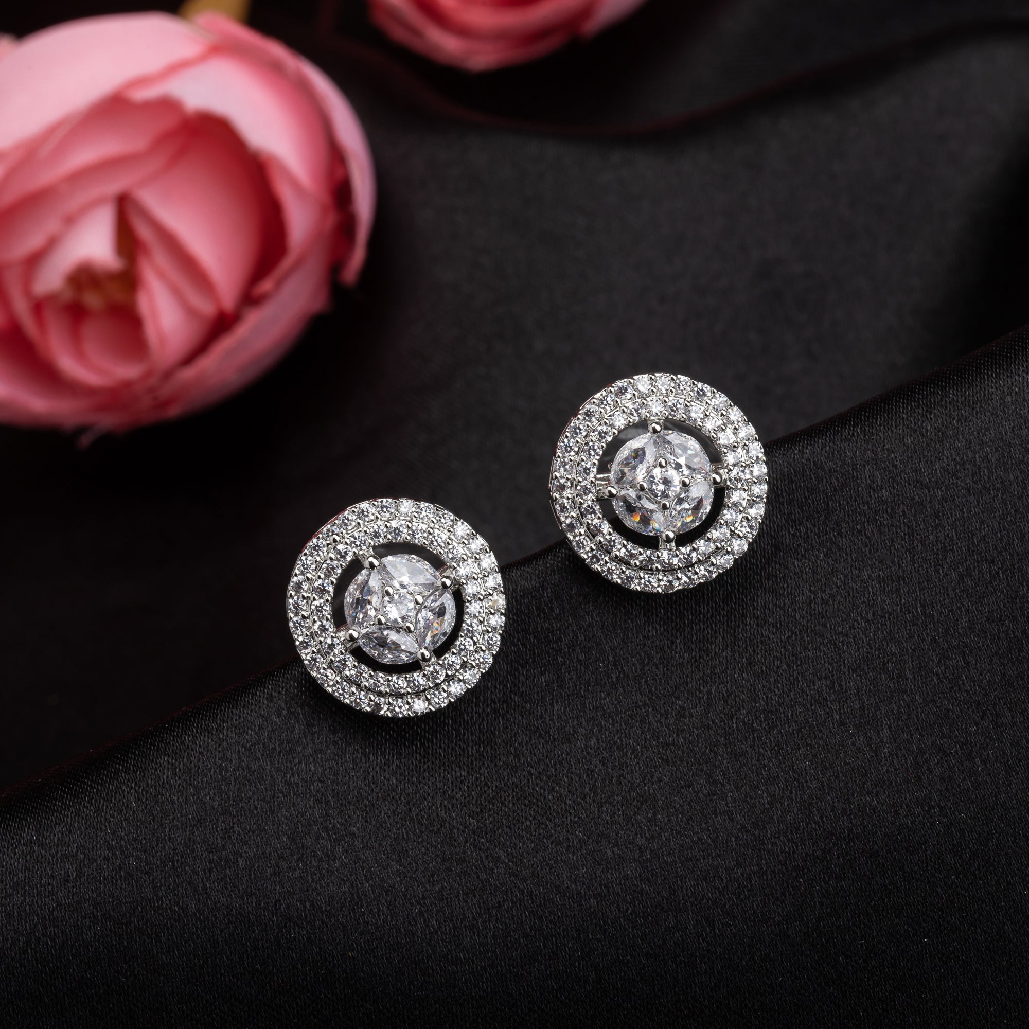 "Timeless zircon stud earrings offer brilliant sparkle and versatile elegance for any occasion."