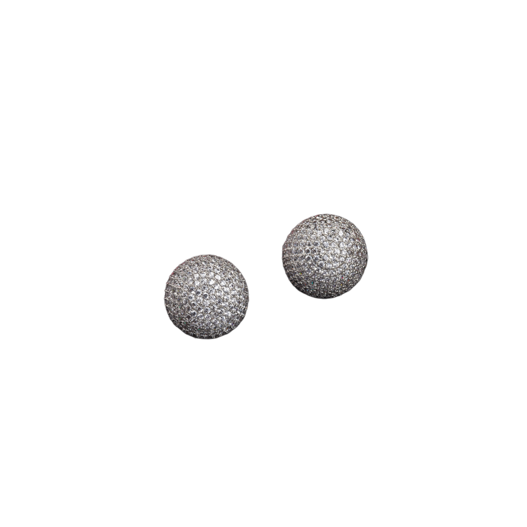 "Timeless zircon stud earrings with brilliant sparkle add versatile elegance to any outfit."